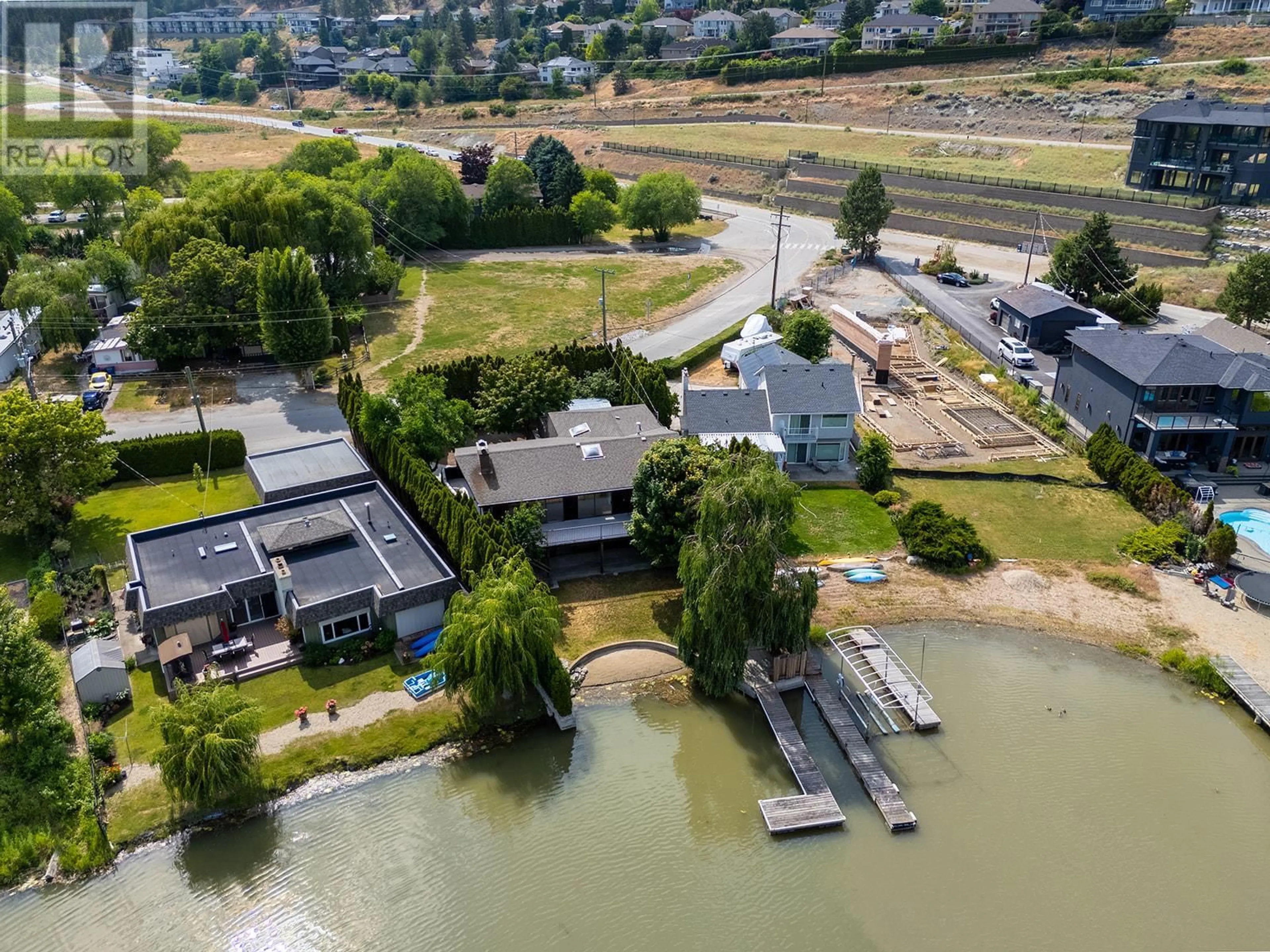 A pic from outside/outdoor area/front of a property/back of a property/a pic from drone, water/lake/river/ocean view for 1440 GREEN BAY ROAD, West Kelowna British Columbia V4T2B8