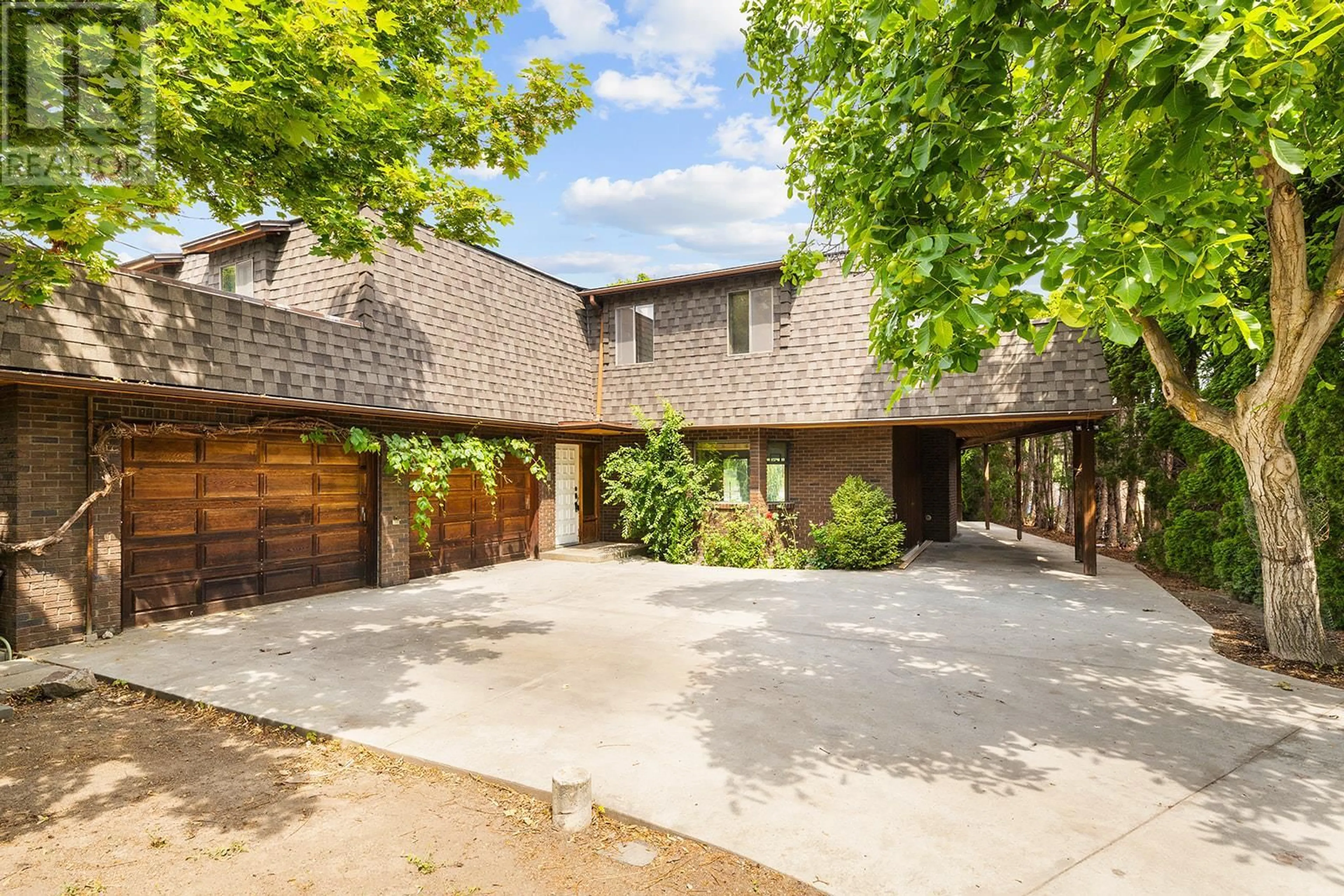A pic from outside/outdoor area/front of a property/back of a property/a pic from drone, street for 1440 GREEN BAY ROAD, West Kelowna British Columbia V4T2B8