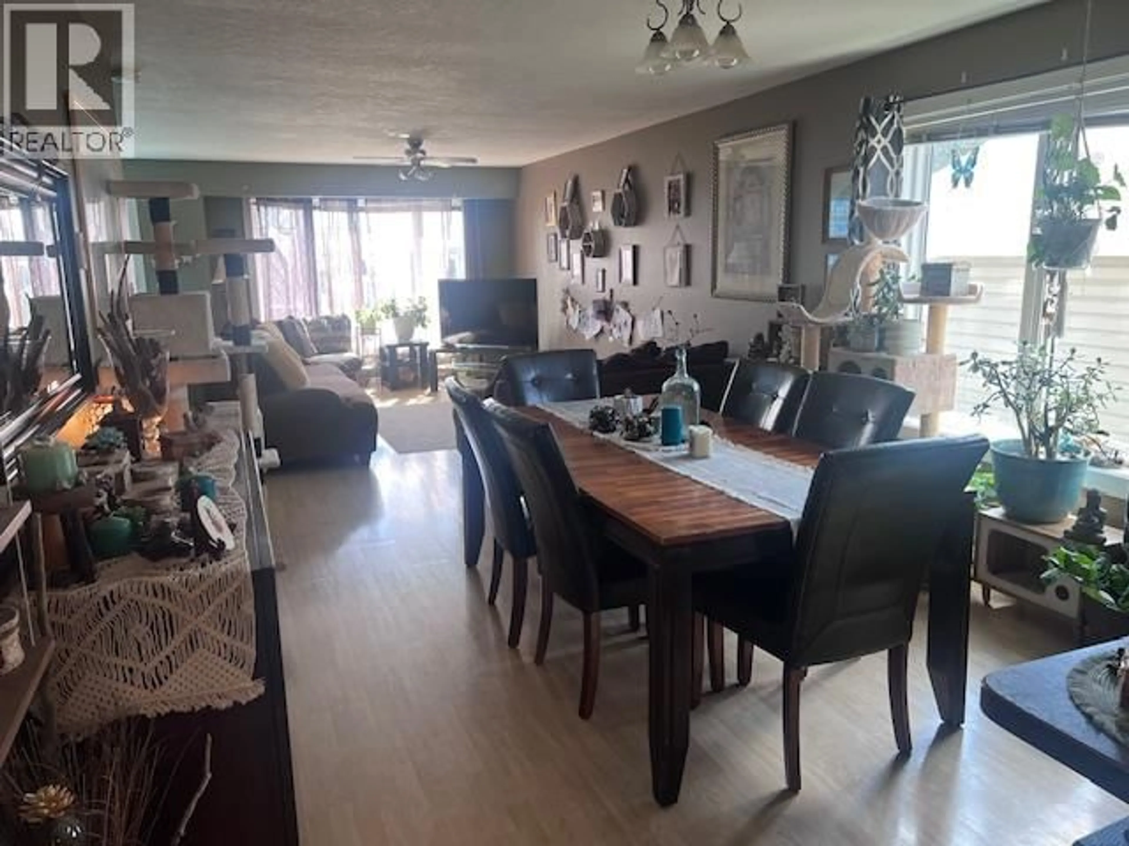 Dining room, wood/laminate floor for 312 99 AVENUE, Dawson Creek British Columbia V1G1S9