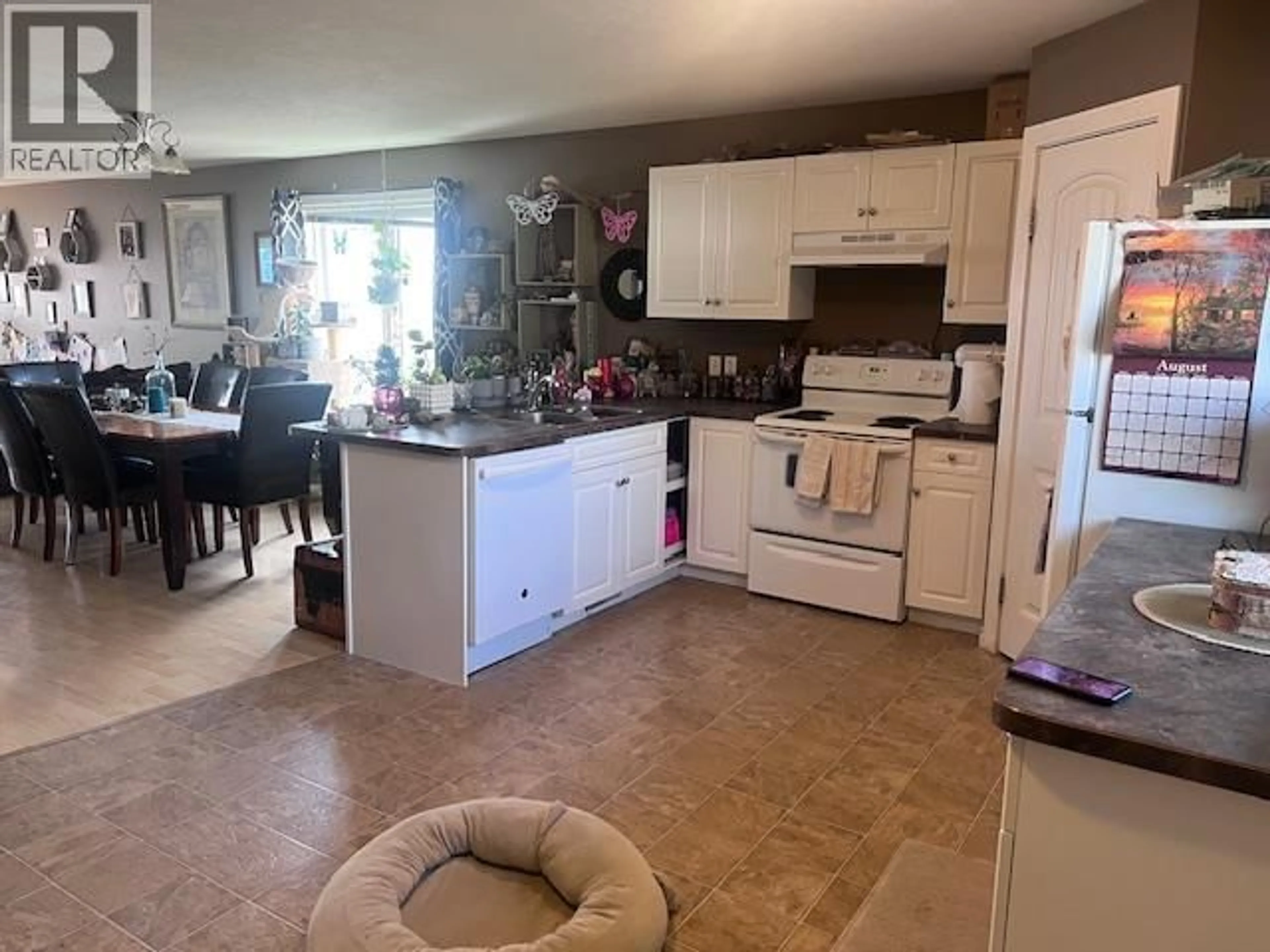Open concept kitchen, ceramic/tile floor for 312 99 AVENUE, Dawson Creek British Columbia V1G1S9