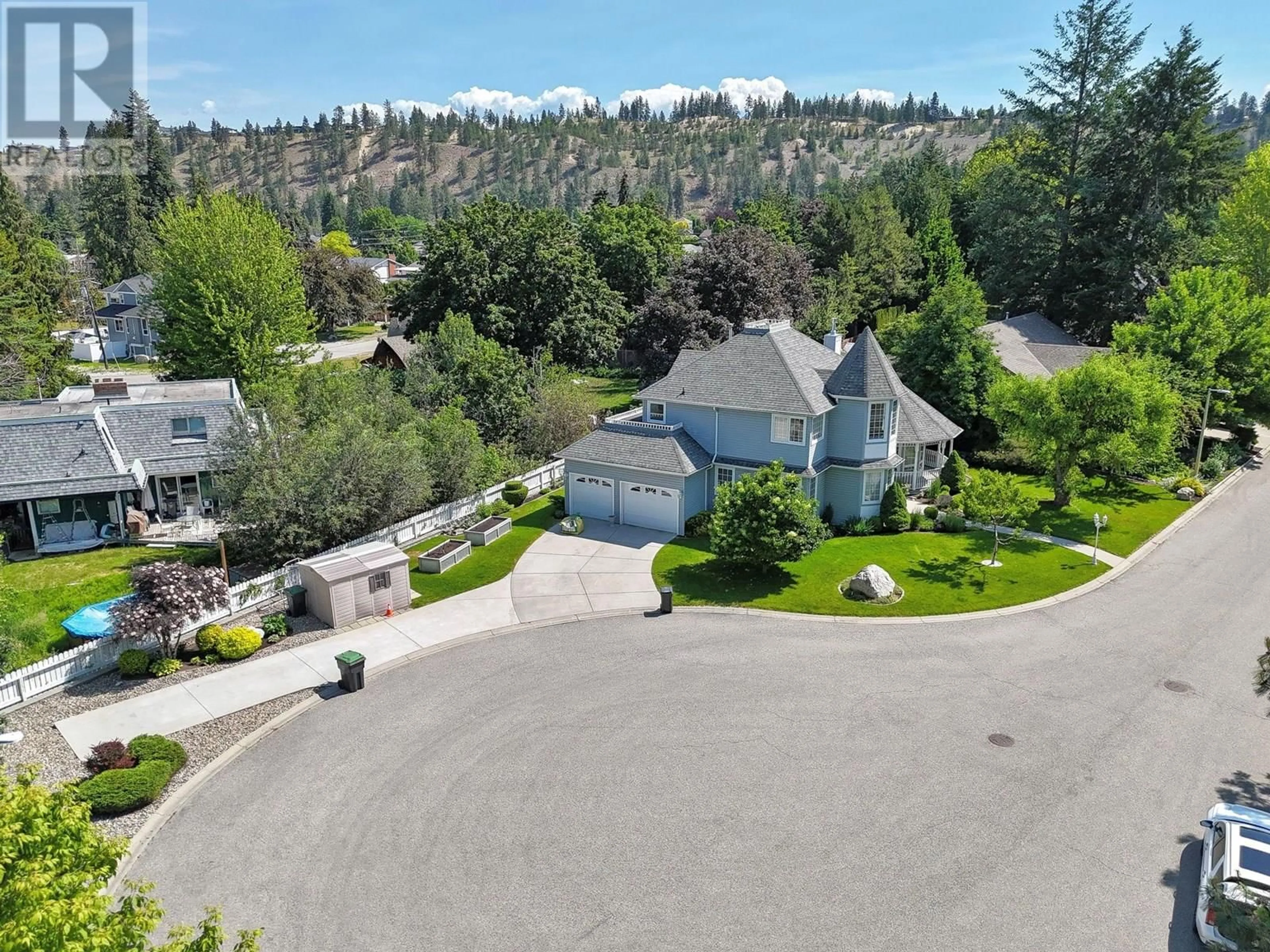 A pic from outside/outdoor area/front of a property/back of a property/a pic from drone, street for 758 VARNEY COURT, Kelowna British Columbia V1W3Z2