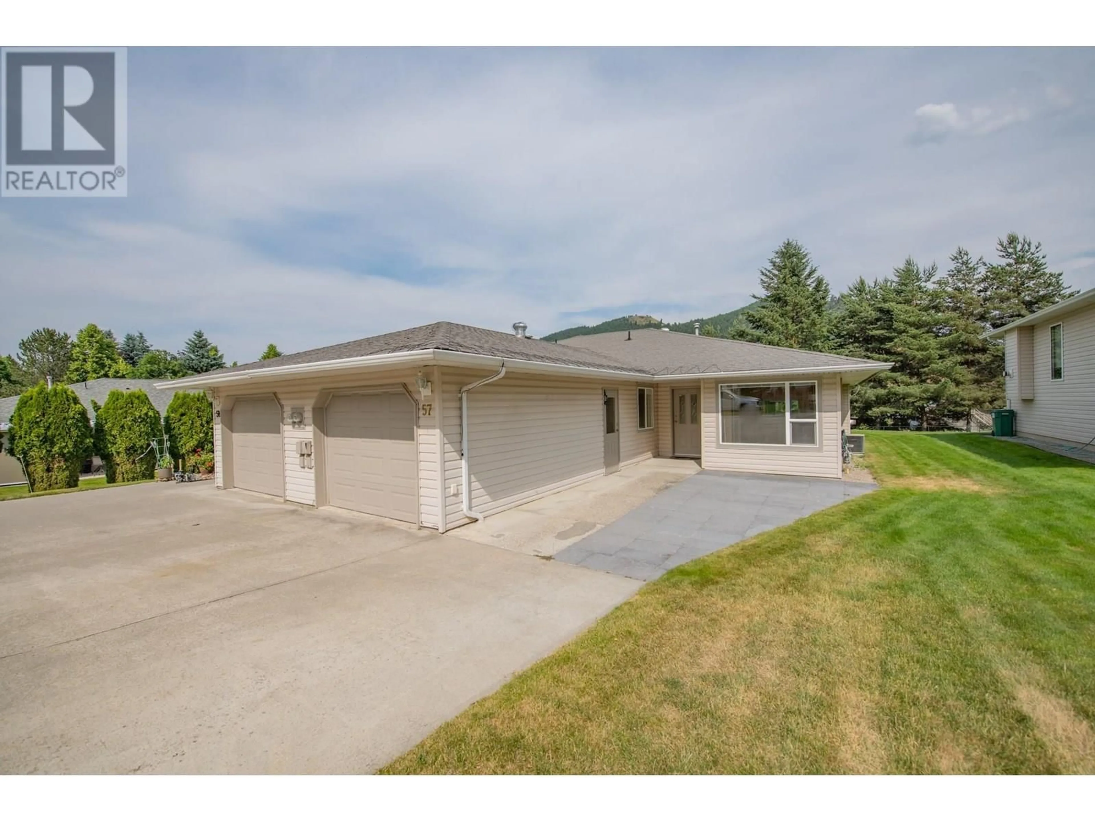 A pic from outside/outdoor area/front of a property/back of a property/a pic from drone, water/lake/river/ocean view for 57 - 2675 PINE AVENUE, Lumby British Columbia V0E2G5