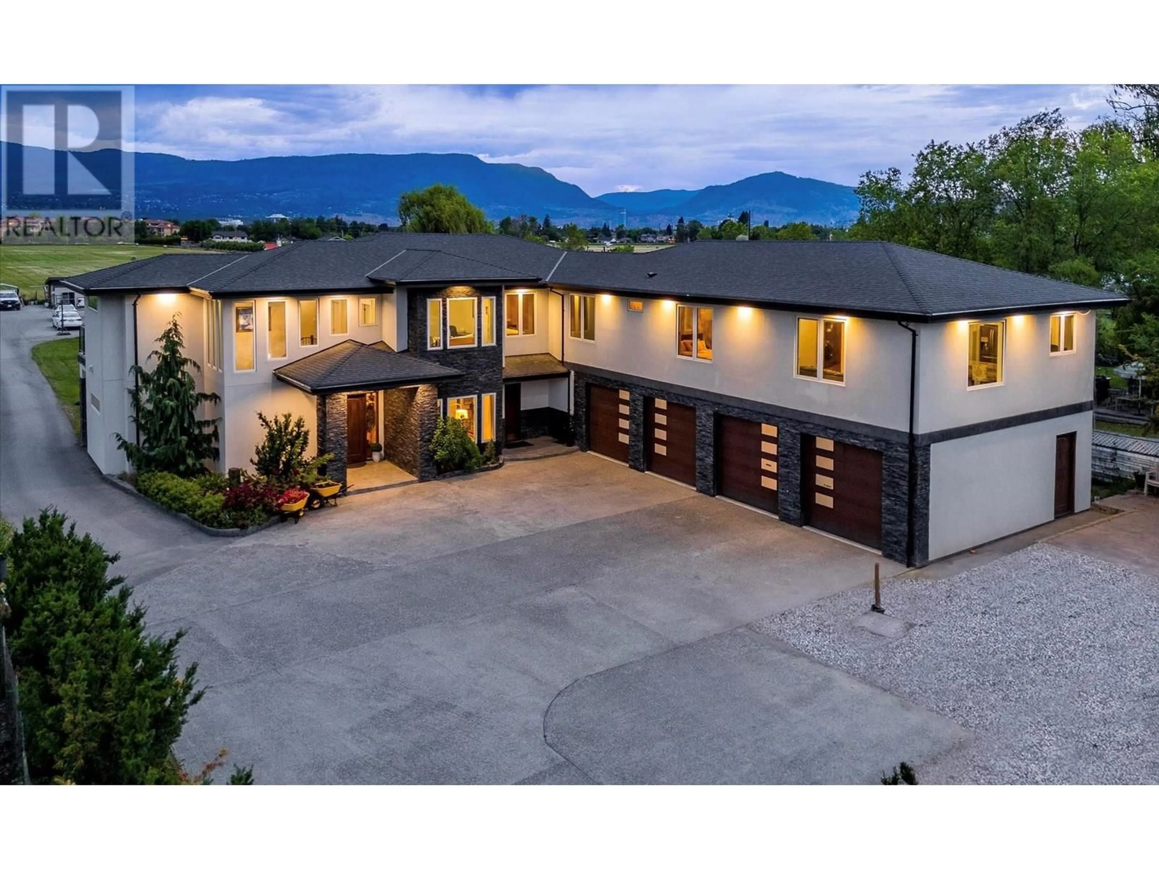 A pic from outside/outdoor area/front of a property/back of a property/a pic from drone, mountain view for 3666 BENVOULIN ROAD, Kelowna British Columbia V1W4M7