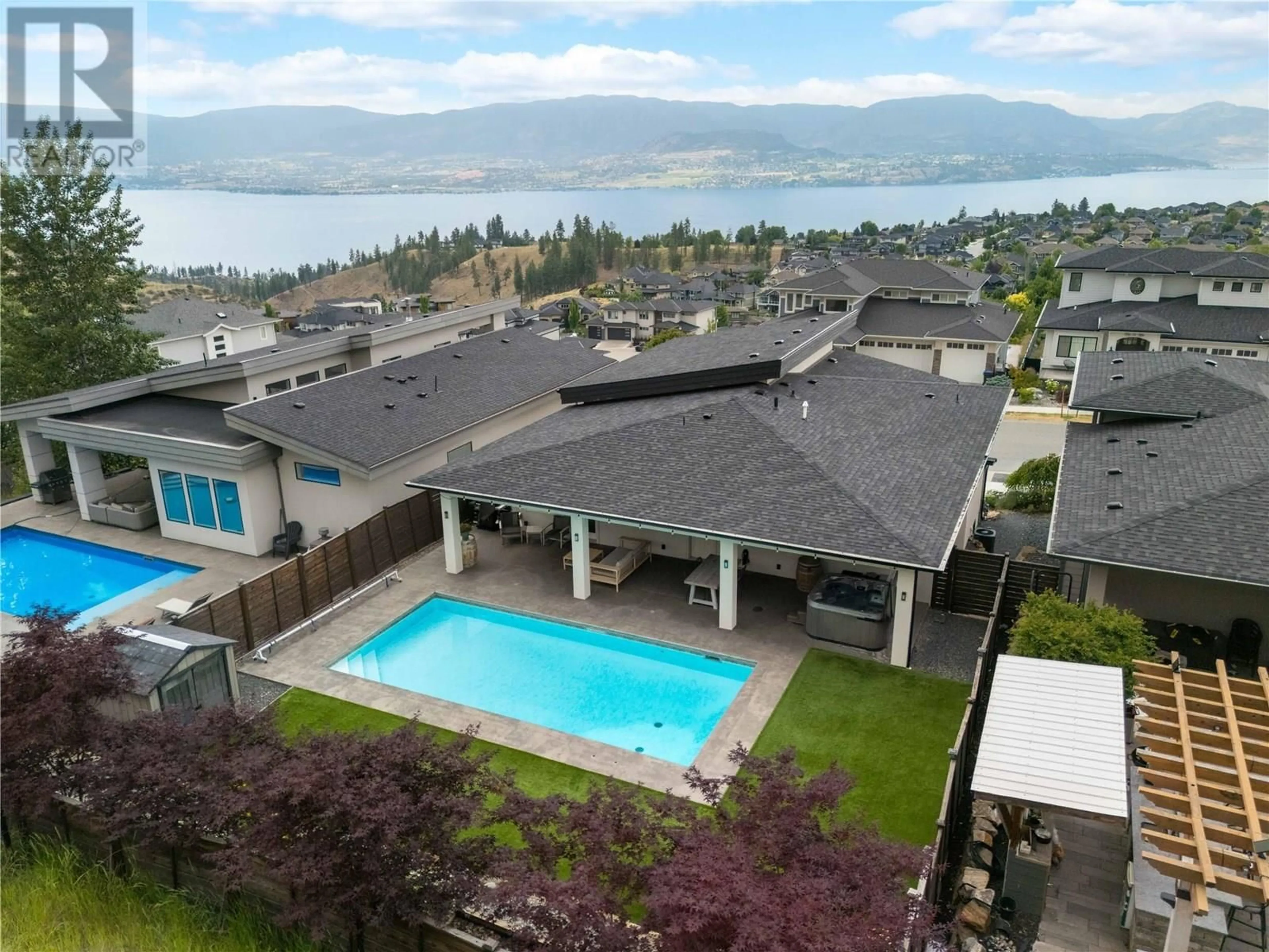 A pic from outside/outdoor area/front of a property/back of a property/a pic from drone, water/lake/river/ocean view for 5653 MOUNTAINSIDE DRIVE, Kelowna British Columbia V1W5L5