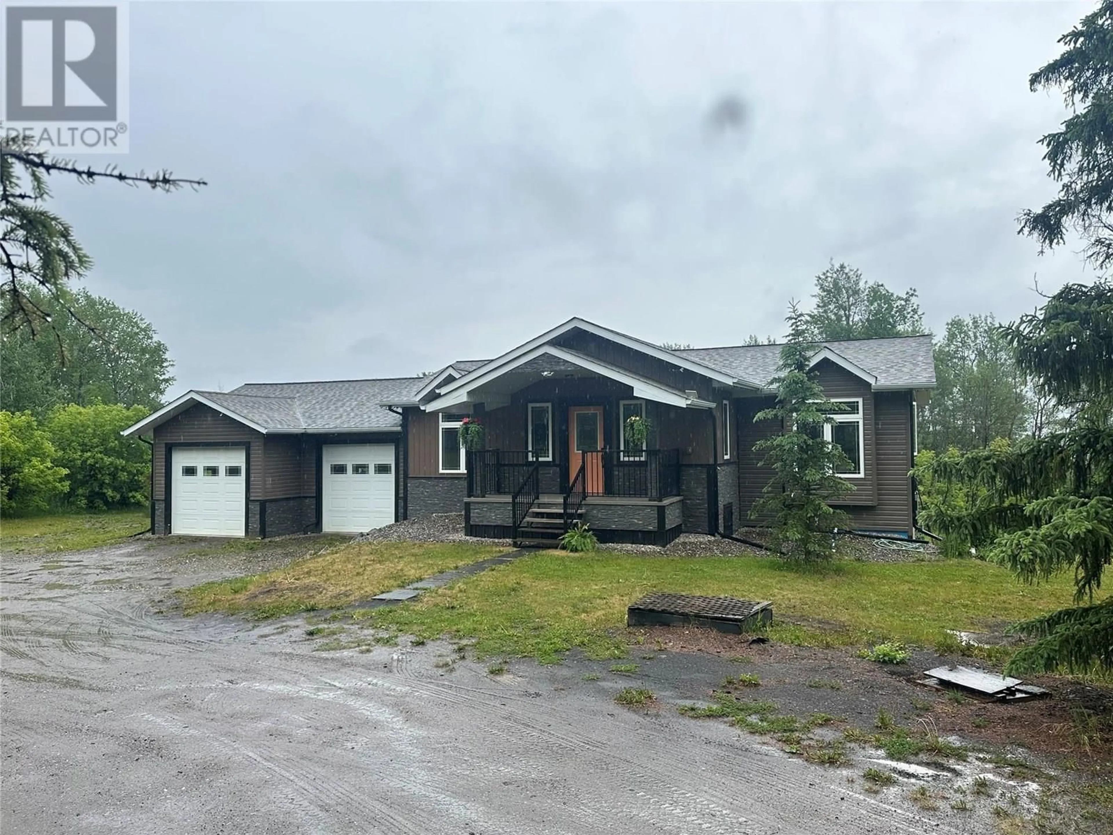 A pic from outside/outdoor area/front of a property/back of a property/a pic from drone, unknown for 5947 KURJATA ROAD, Chetwynd British Columbia V0C1J0