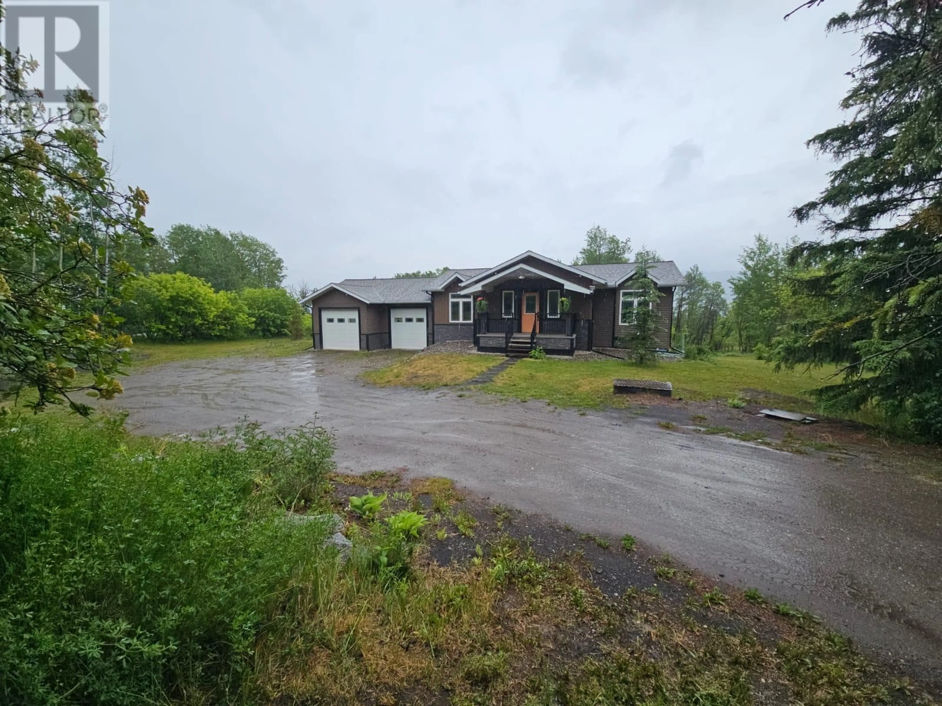 A pic from outside/outdoor area/front of a property/back of a property/a pic from drone, unknown for 5947 KURJATA ROAD, Chetwynd British Columbia V0C1J0