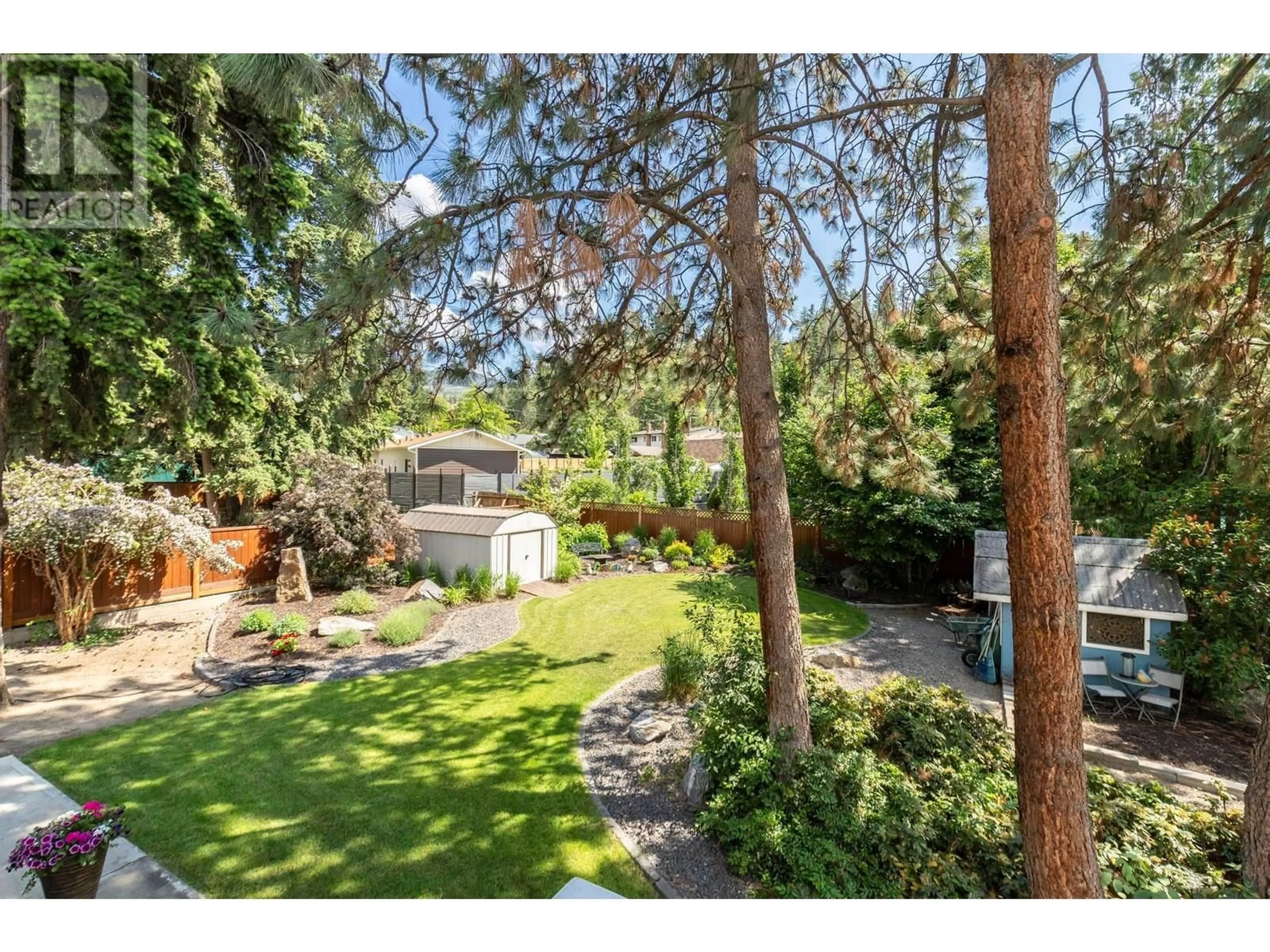 A pic from outside/outdoor area/front of a property/back of a property/a pic from drone, street for 4764 GORDON DRIVE, Kelowna British Columbia V1W4P3