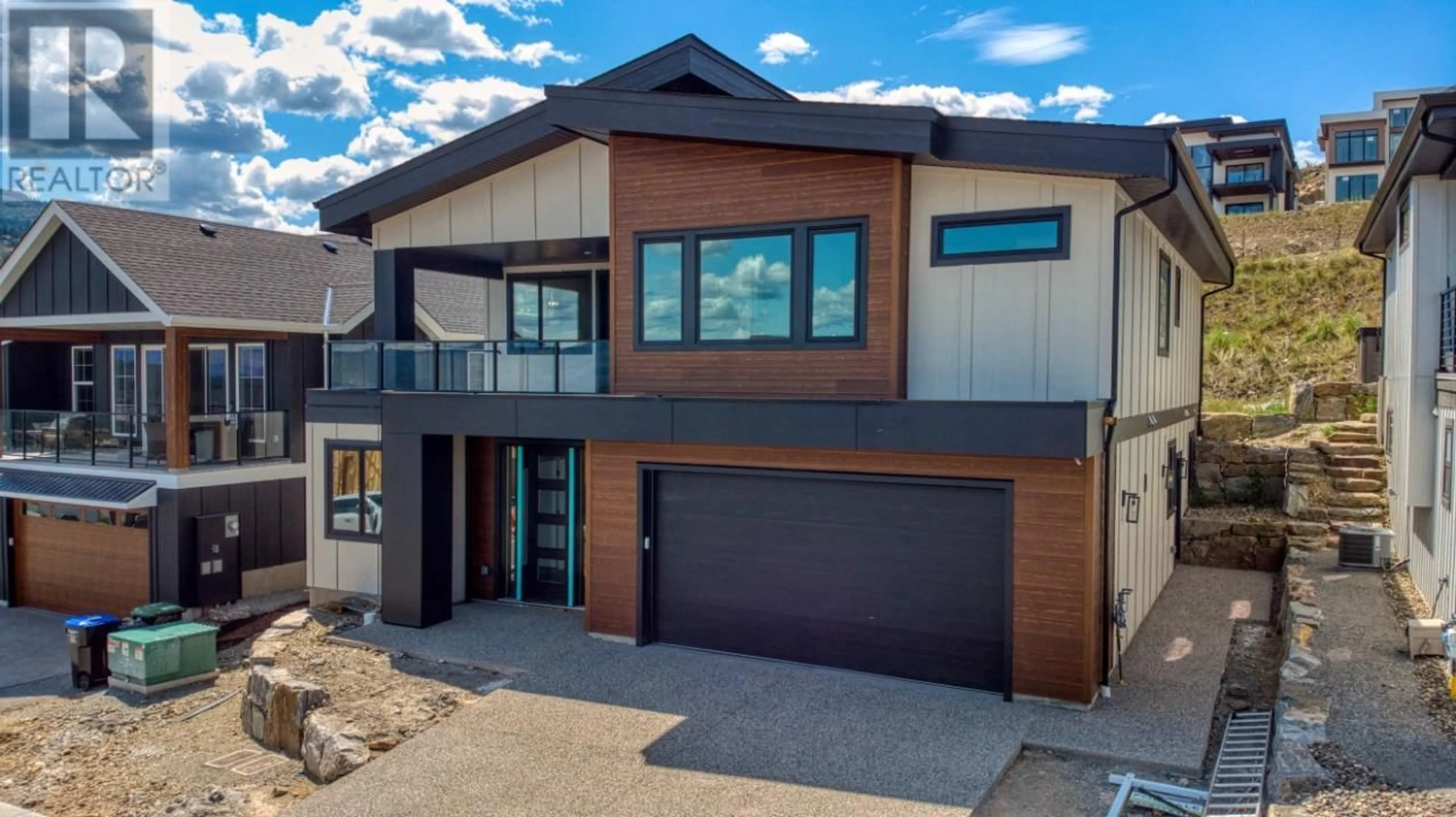 Home with brick exterior material, street for 1119 COLLINSON COURT, Kelowna British Columbia V1W0C3