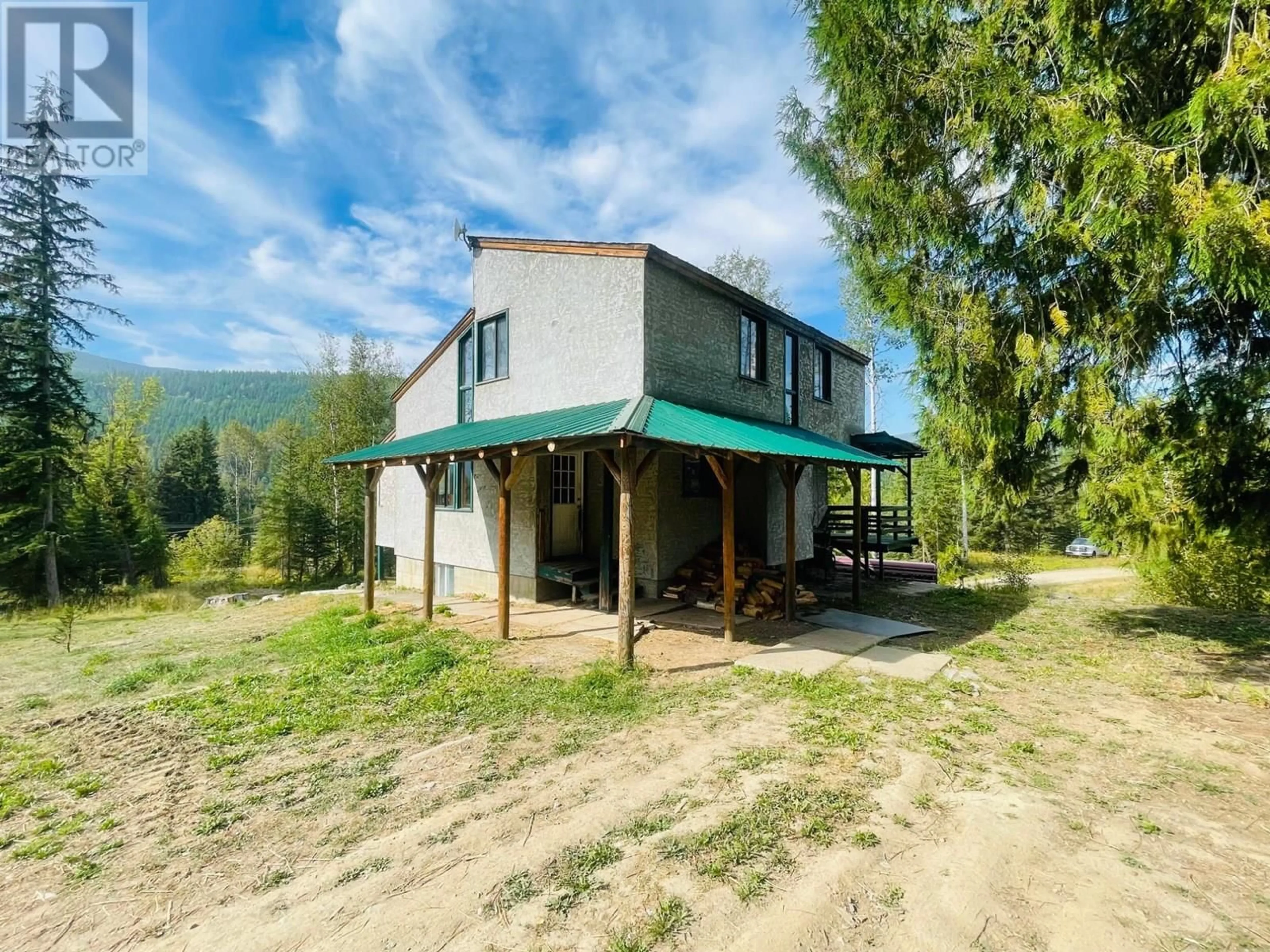 A pic from outside/outdoor area/front of a property/back of a property/a pic from drone, unknown for 7826 3 HIGHWAY, Yahk British Columbia V0B2P0
