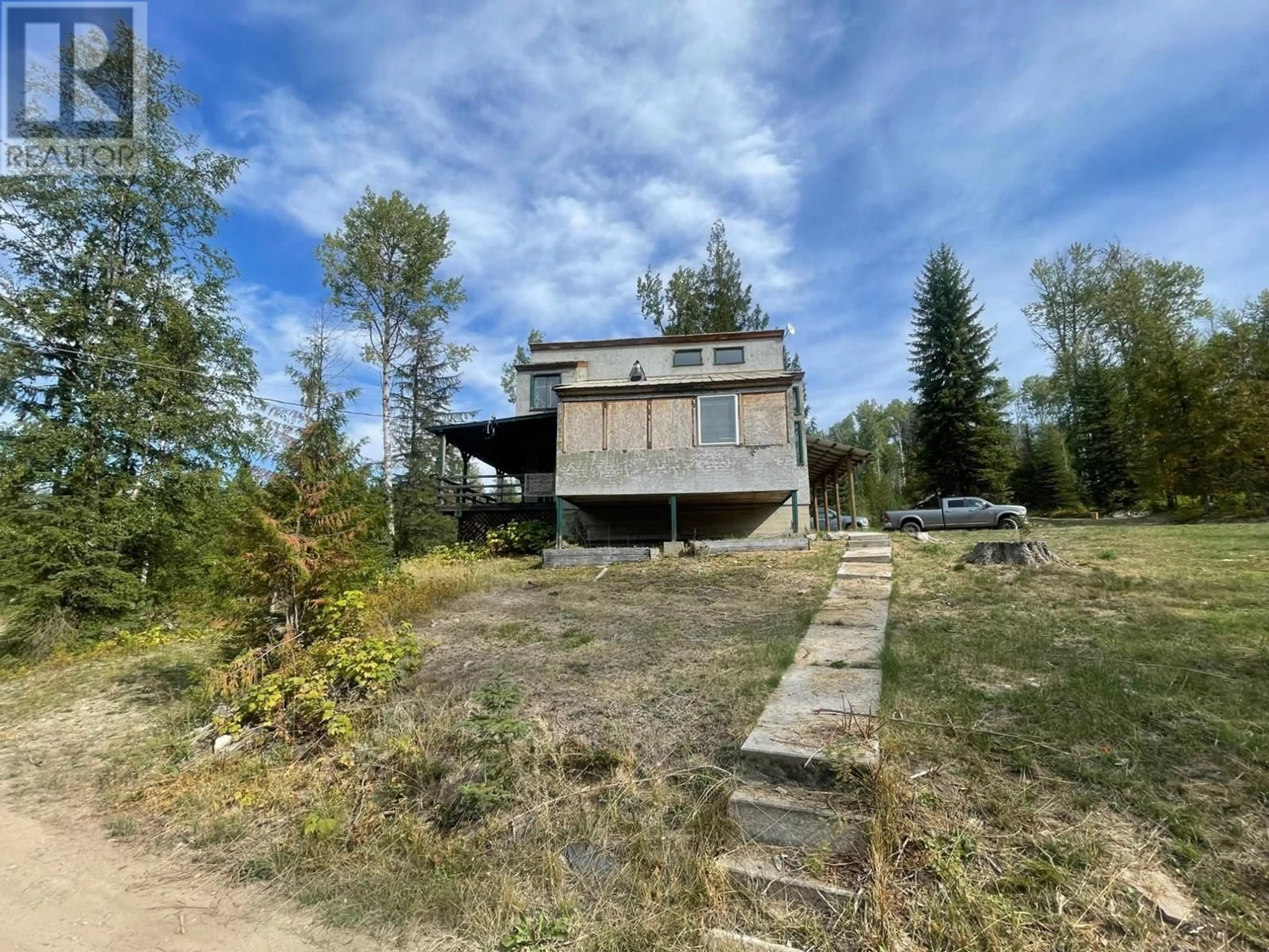A pic from outside/outdoor area/front of a property/back of a property/a pic from drone, unknown for 7826 3 HIGHWAY, Yahk British Columbia V0B2P0