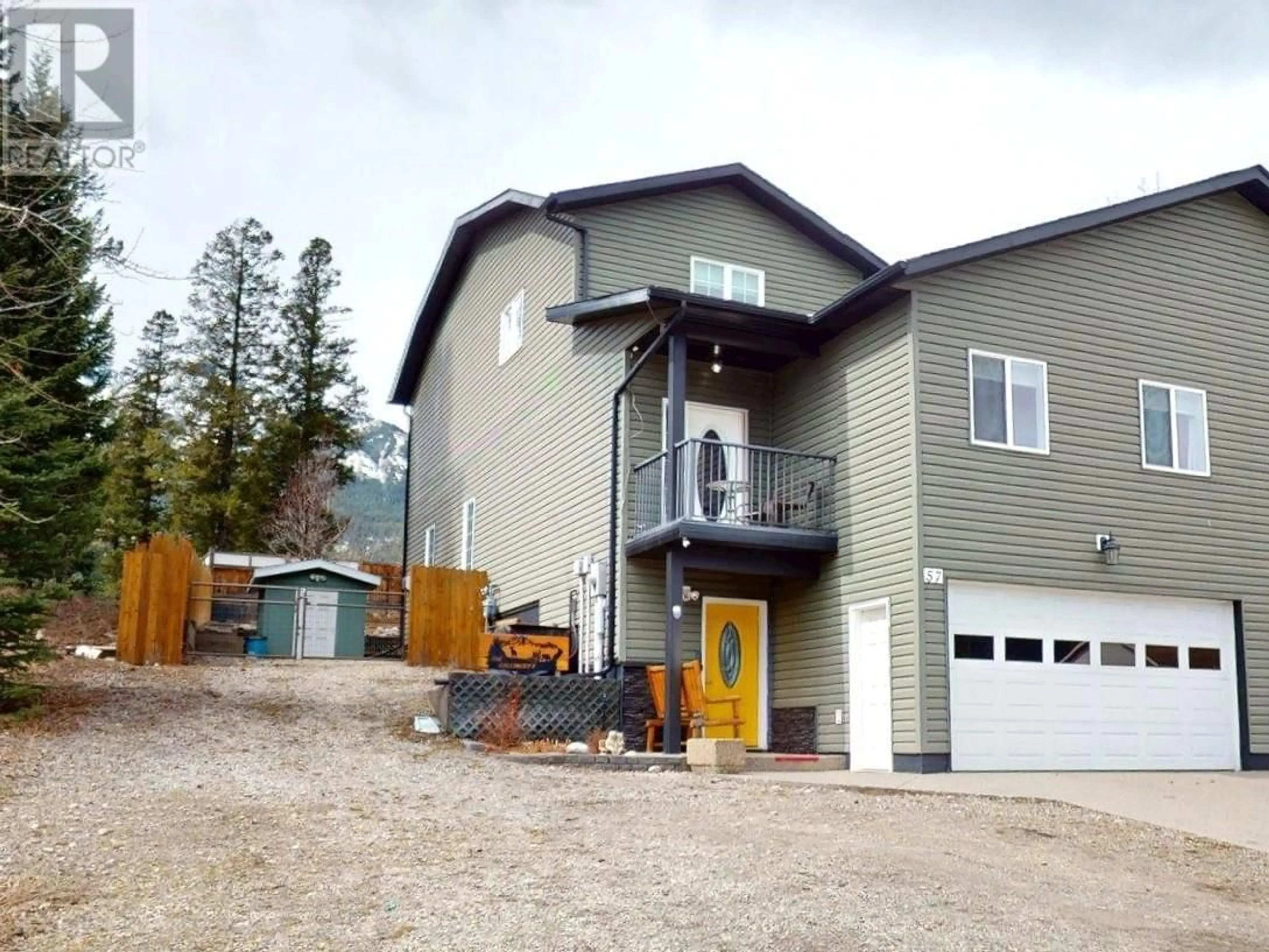 Home with vinyl exterior material, mountain view for 57 CARIBOO DRIVE, Elkford British Columbia V0B1H0