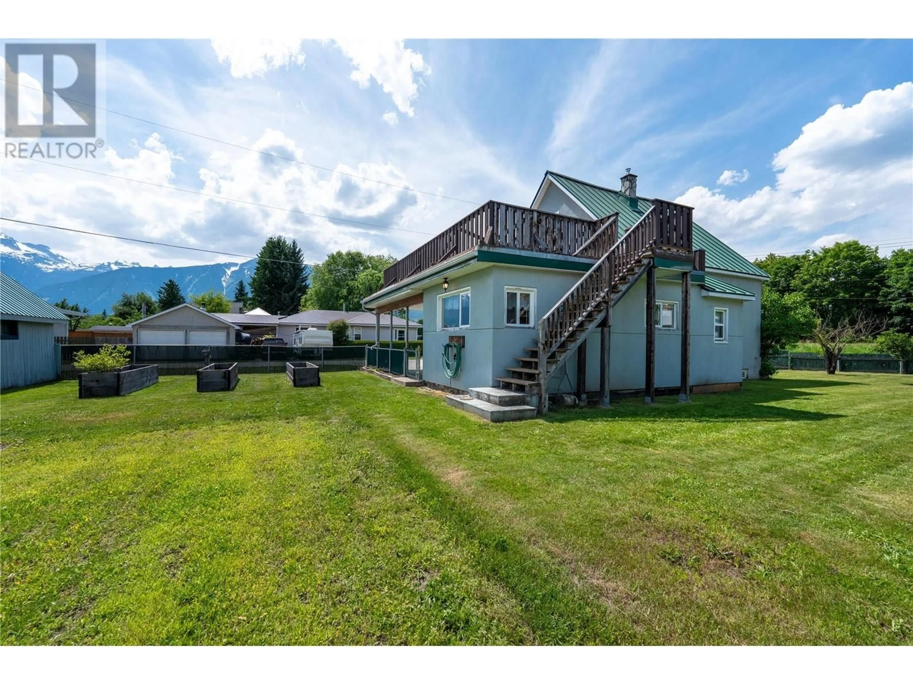 A pic from outside/outdoor area/front of a property/back of a property/a pic from drone, mountain view for 614 RAILWAY AVENUE, Revelstoke British Columbia V0E2S0