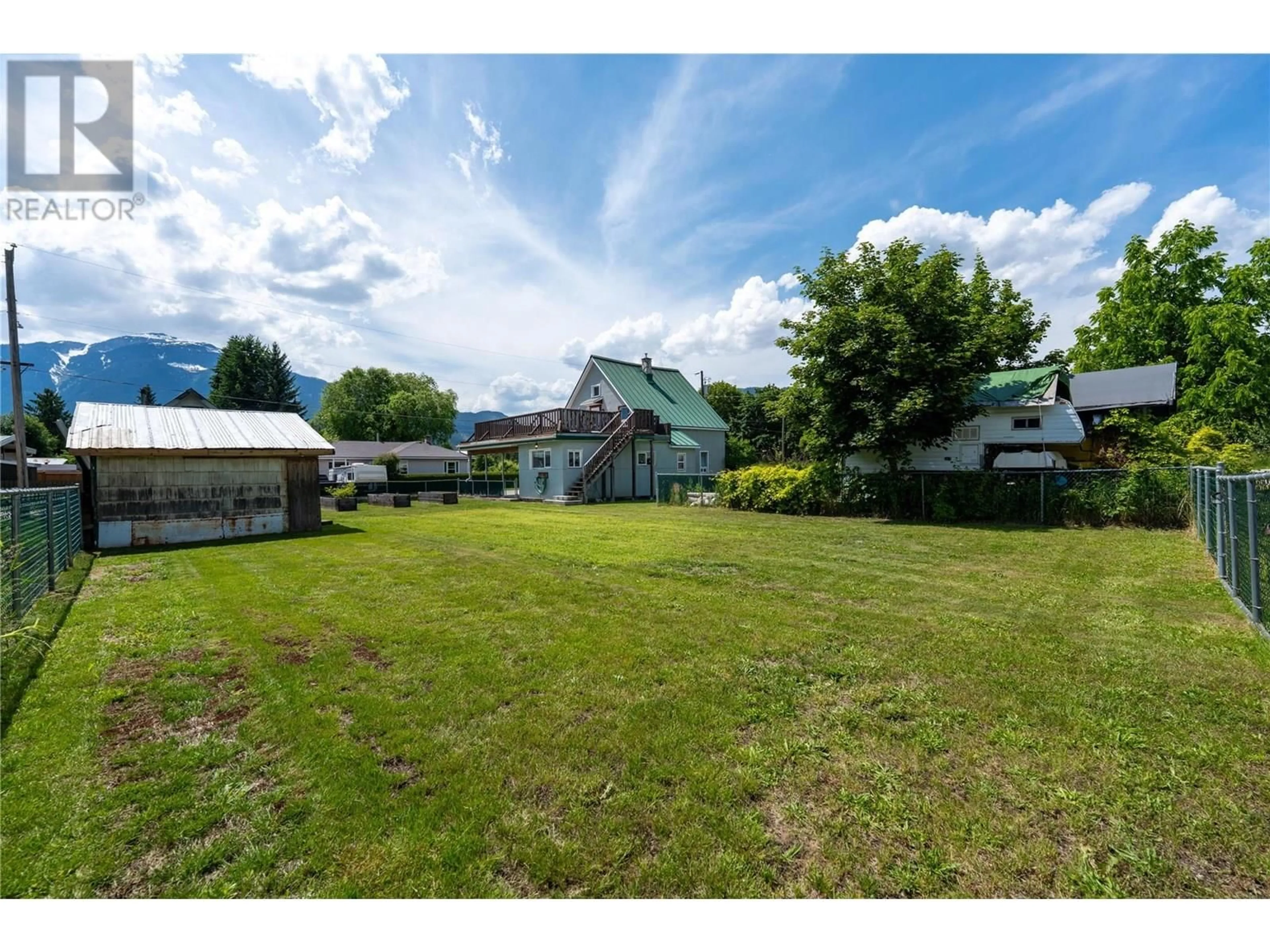 A pic from outside/outdoor area/front of a property/back of a property/a pic from drone, mountain view for 614 RAILWAY AVENUE, Revelstoke British Columbia V0E2S0