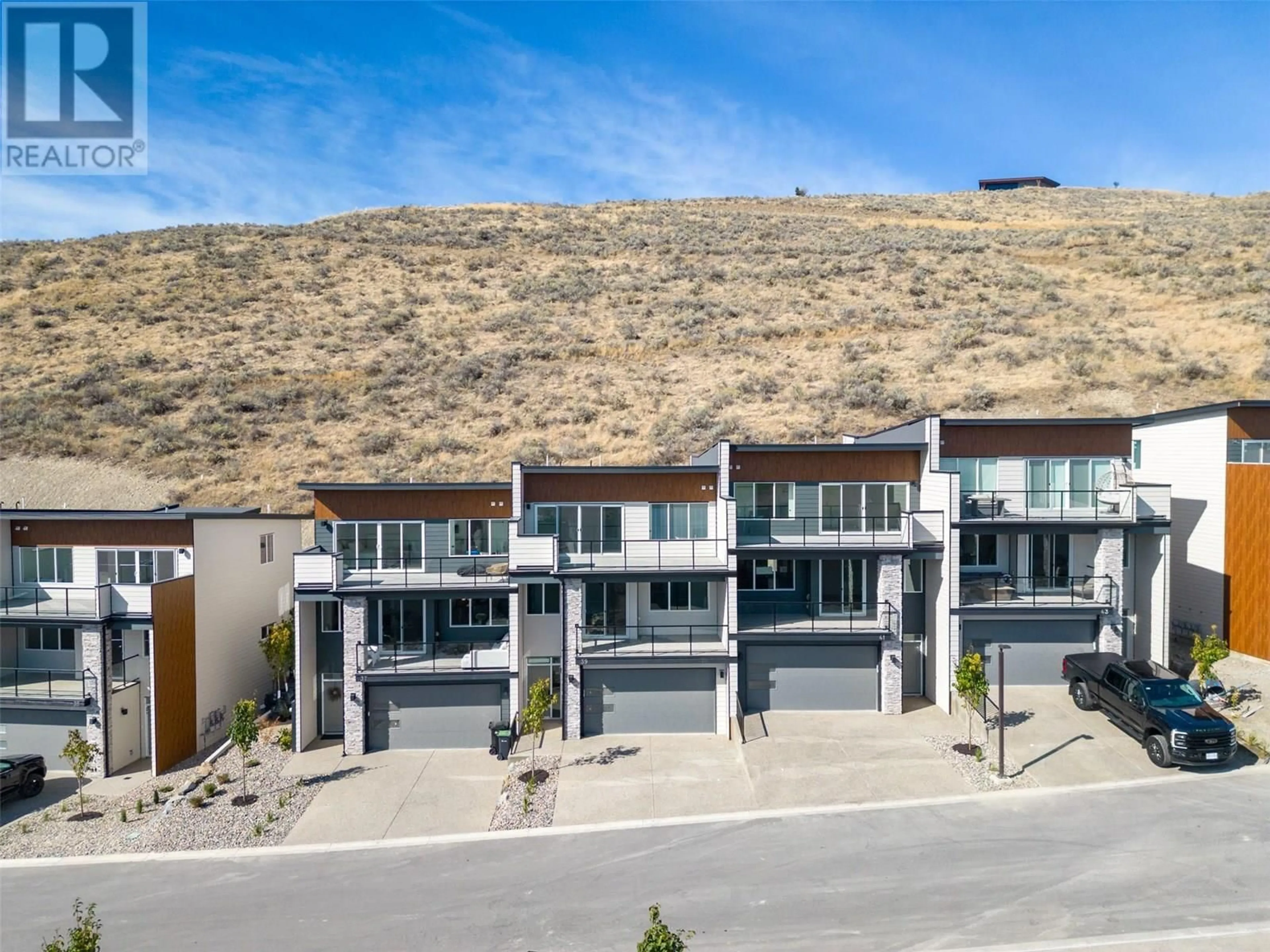 A pic from outside/outdoor area/front of a property/back of a property/a pic from drone, unknown for 35 - 7735 OKANAGAN HILLS BOULEVARD, Vernon British Columbia V1H0A7