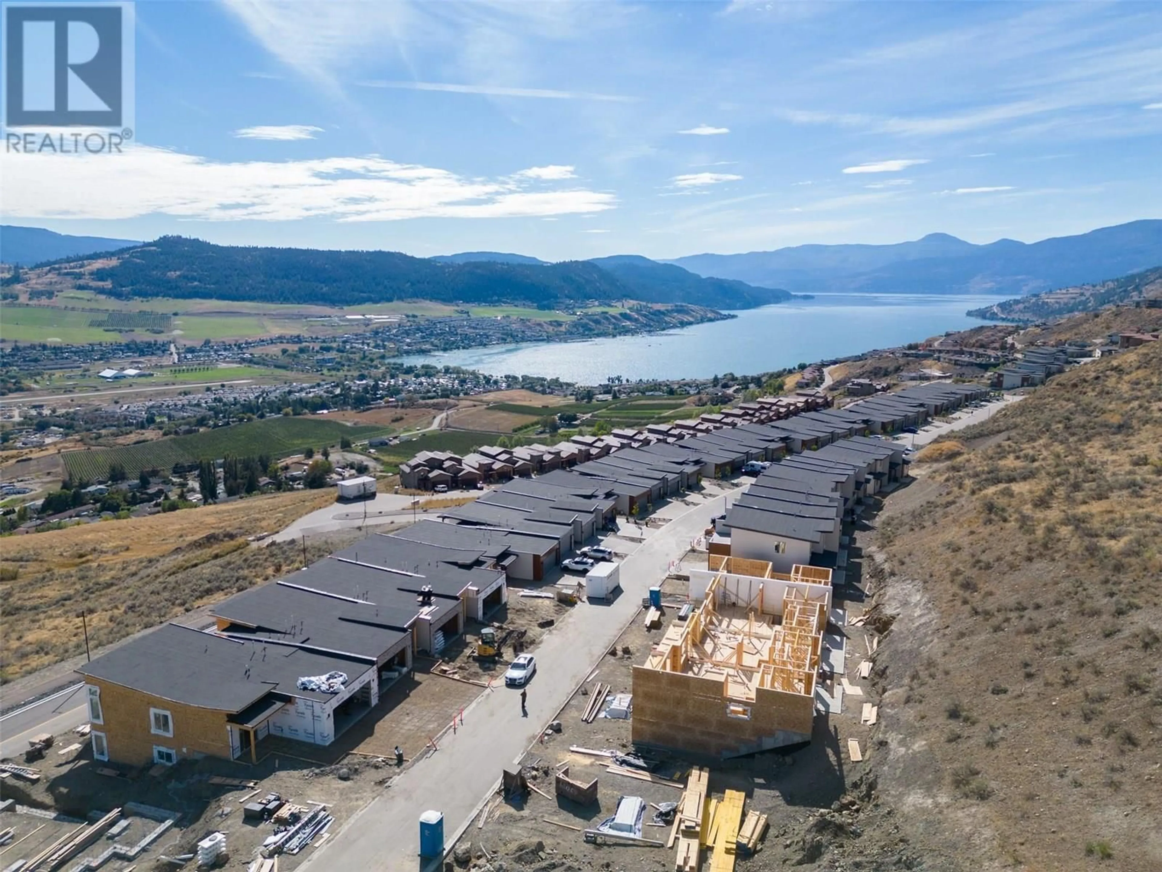 A pic from outside/outdoor area/front of a property/back of a property/a pic from drone, unknown for 35 - 7735 OKANAGAN HILLS BOULEVARD, Vernon British Columbia V1H0A7