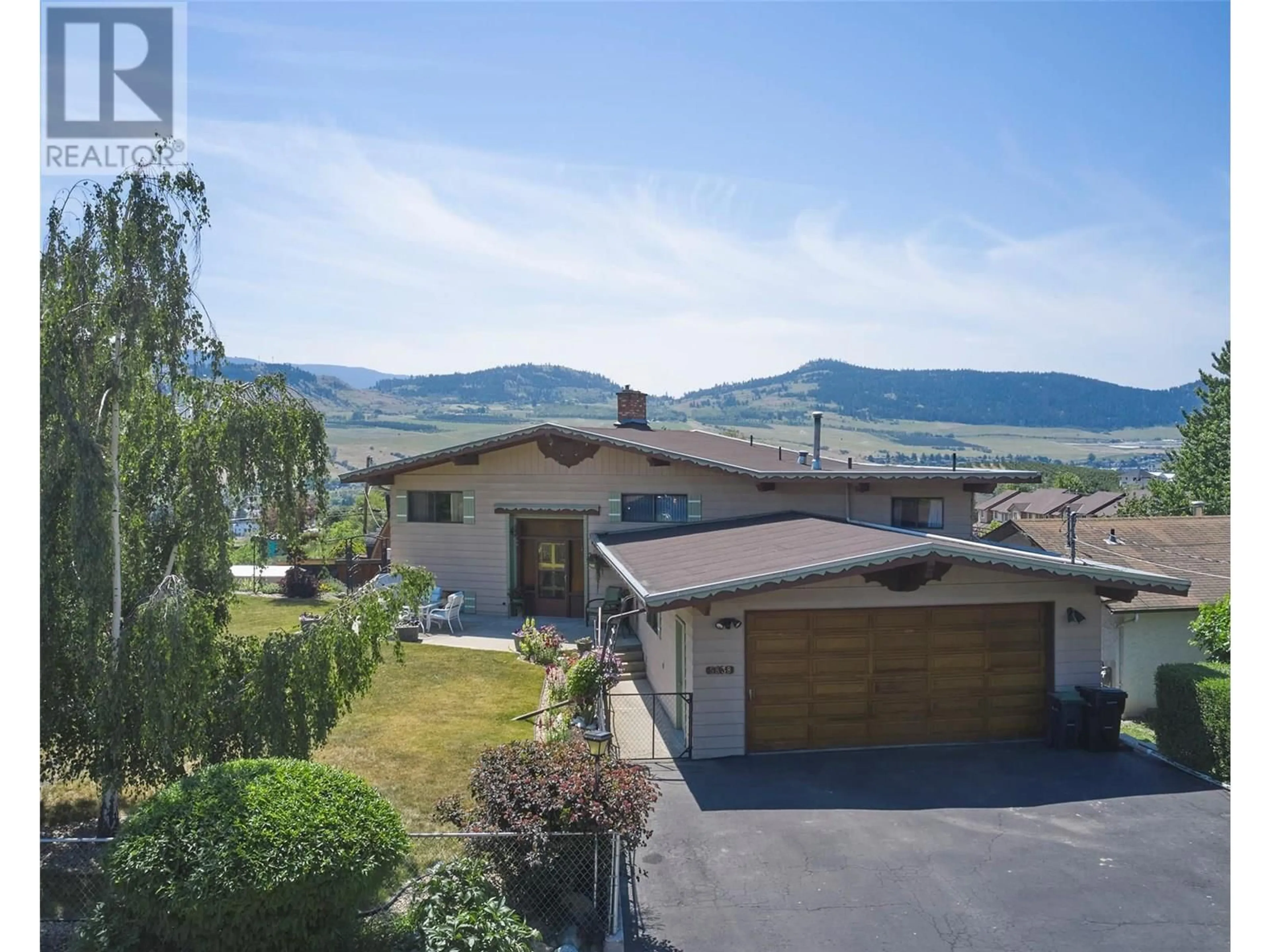 A pic from outside/outdoor area/front of a property/back of a property/a pic from drone, water/lake/river/ocean view for 5838 FLEMISH PLACE, Vernon British Columbia V1H1B2