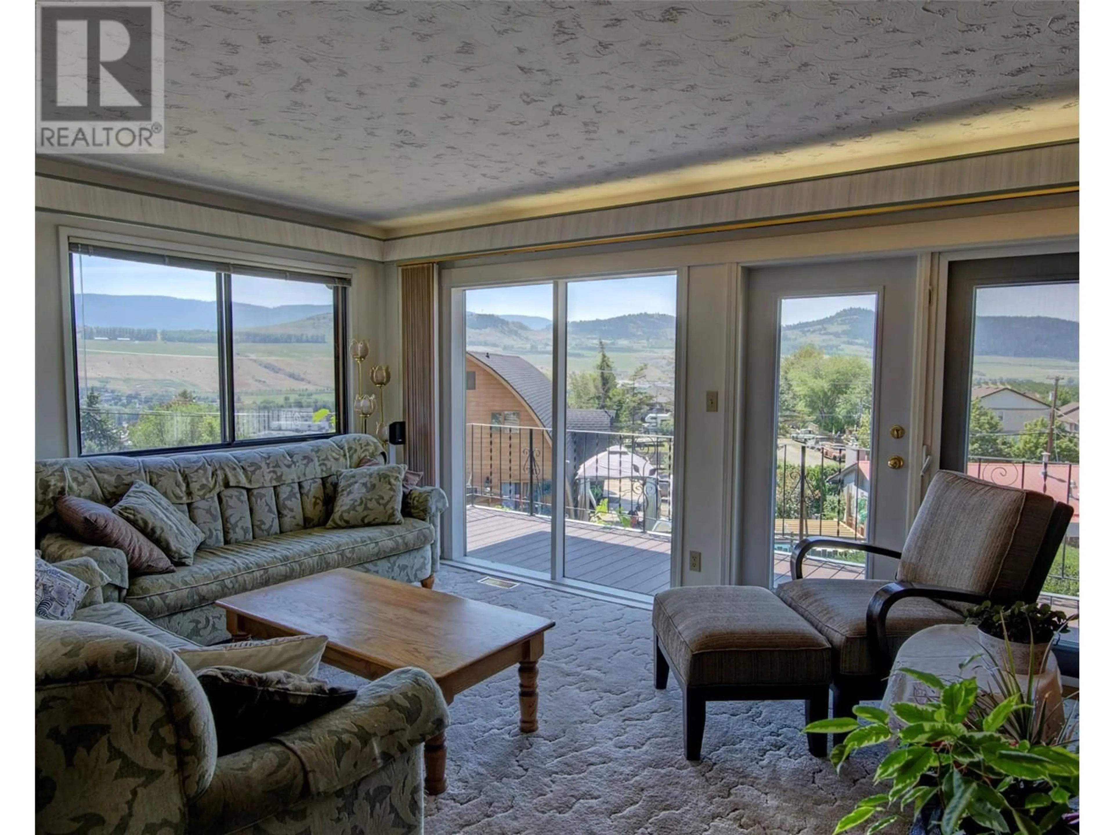 Living room with furniture, unknown for 5838 FLEMISH PLACE, Vernon British Columbia V1H1B2