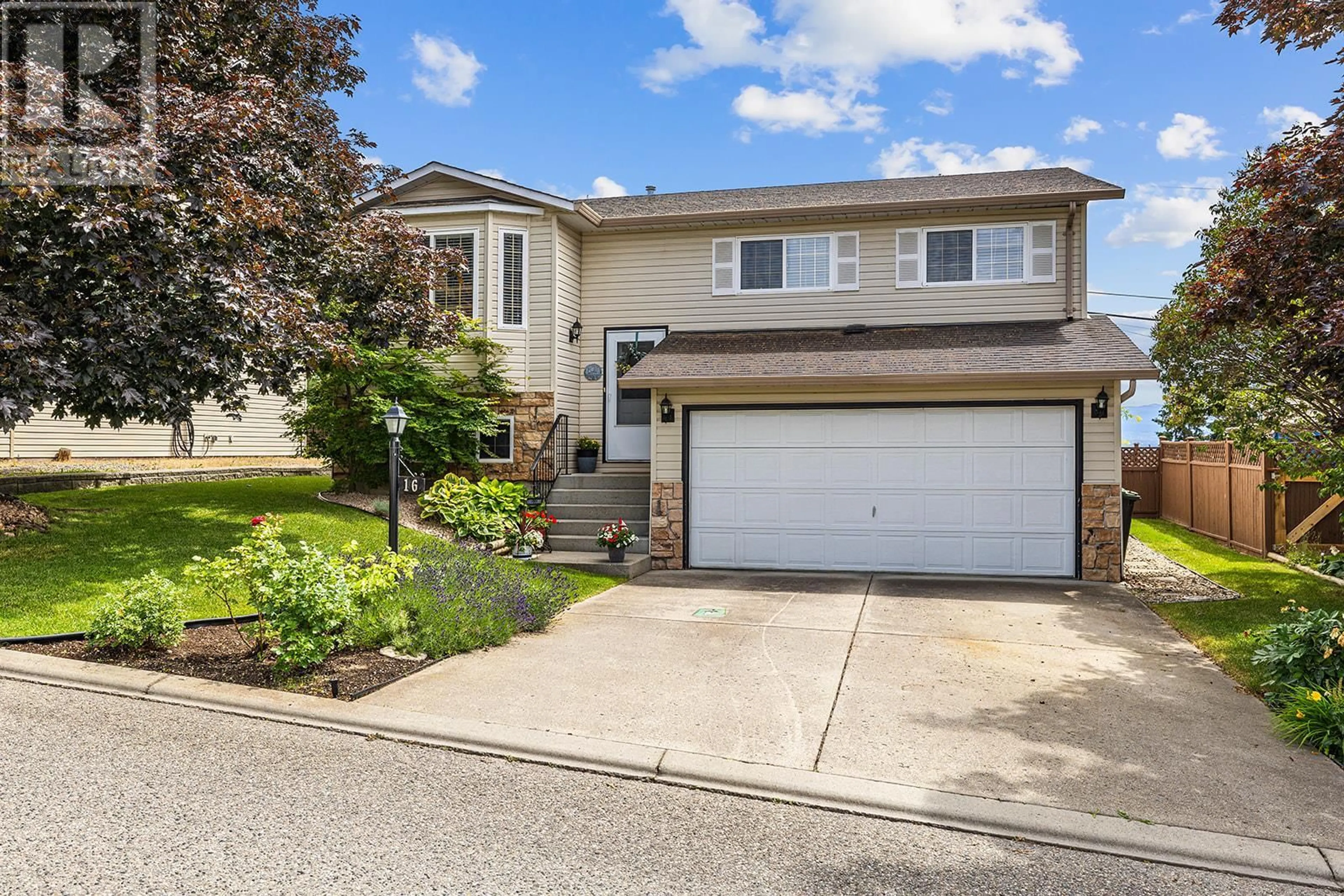 Home with vinyl exterior material, street for 16 - 6100 OLD VERNON ROAD, Kelowna British Columbia V1X7T8