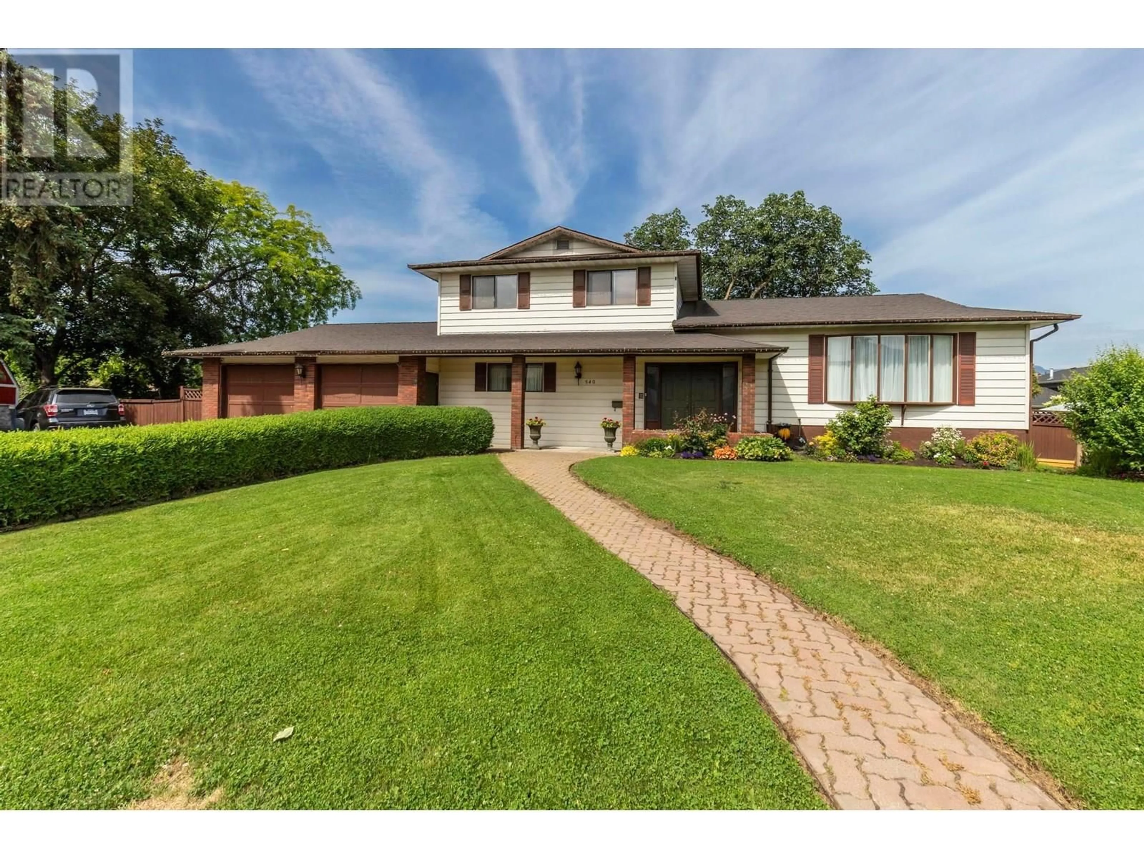 Home with brick exterior material, street for 540 GRAMIAK ROAD, Kelowna British Columbia V1X1K5