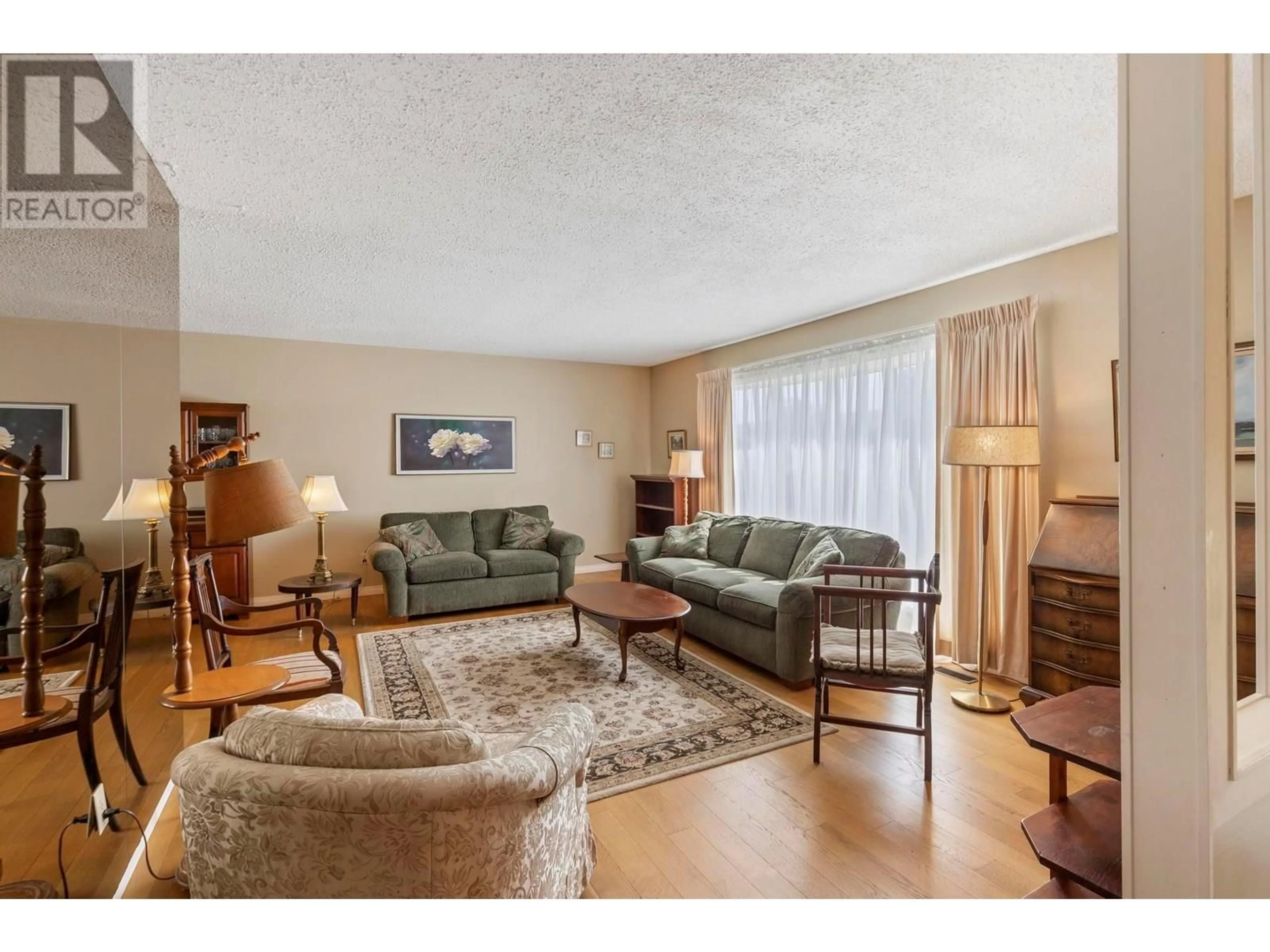 Living room with furniture, unknown for 540 GRAMIAK ROAD, Kelowna British Columbia V1X1K5