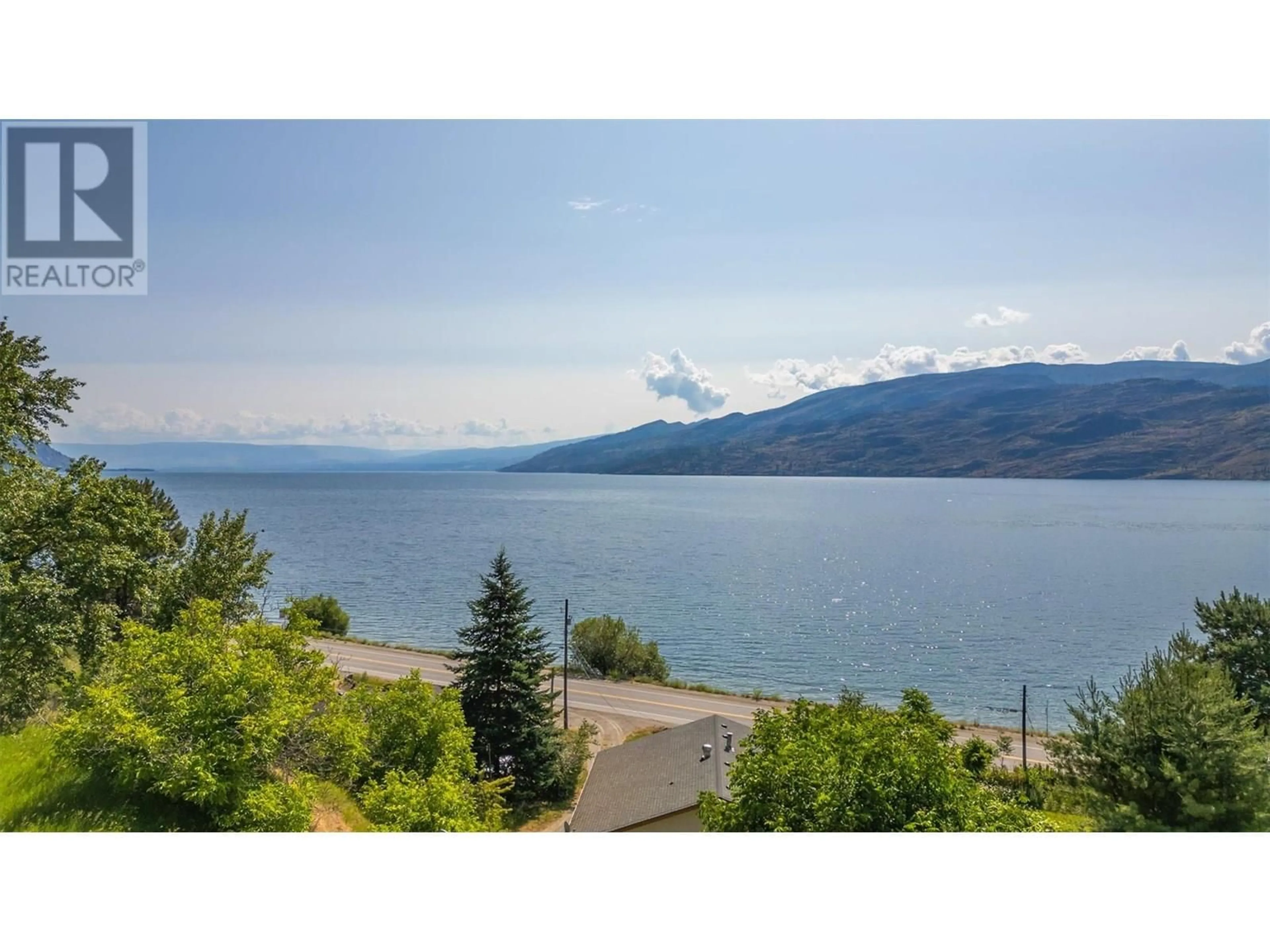 A pic from outside/outdoor area/front of a property/back of a property/a pic from drone, water/lake/river/ocean view for 6086 HIGHWAY 97 OTHER, Peachland British Columbia V0H1X7