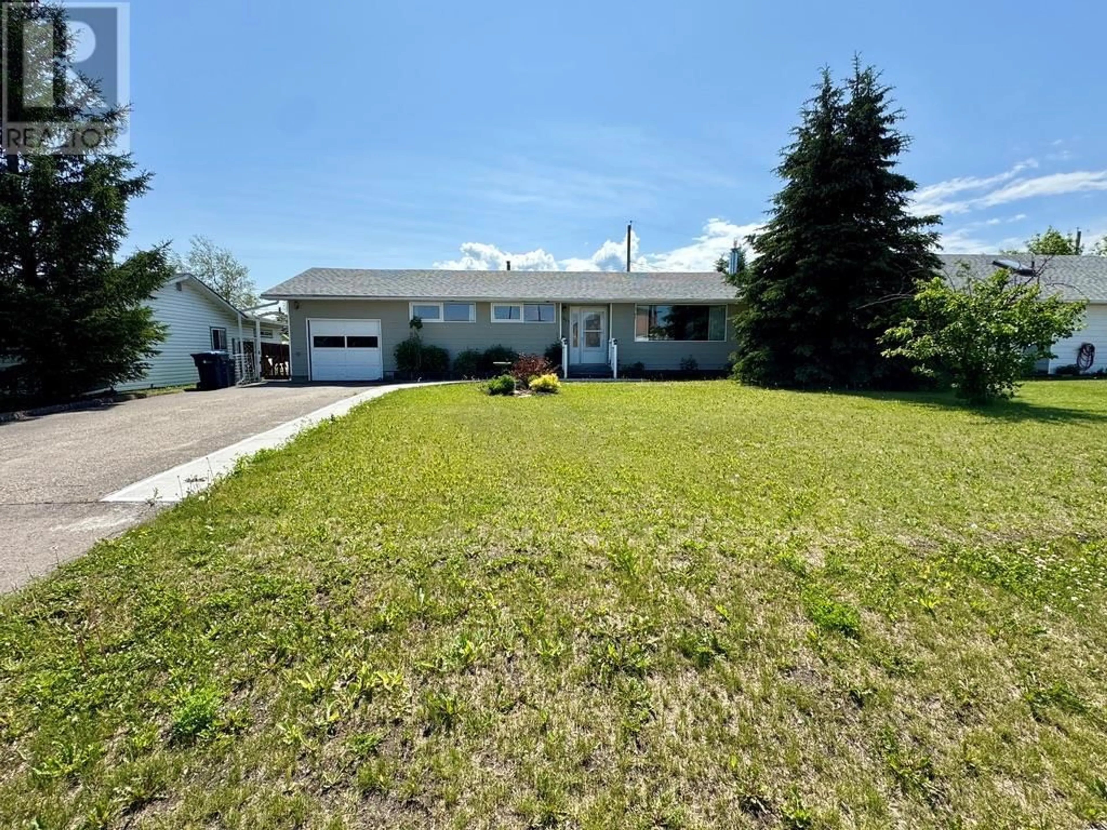 A pic from outside/outdoor area/front of a property/back of a property/a pic from drone, street for 1209 112 AVENUE, Dawson Creek British Columbia V1G2Y4
