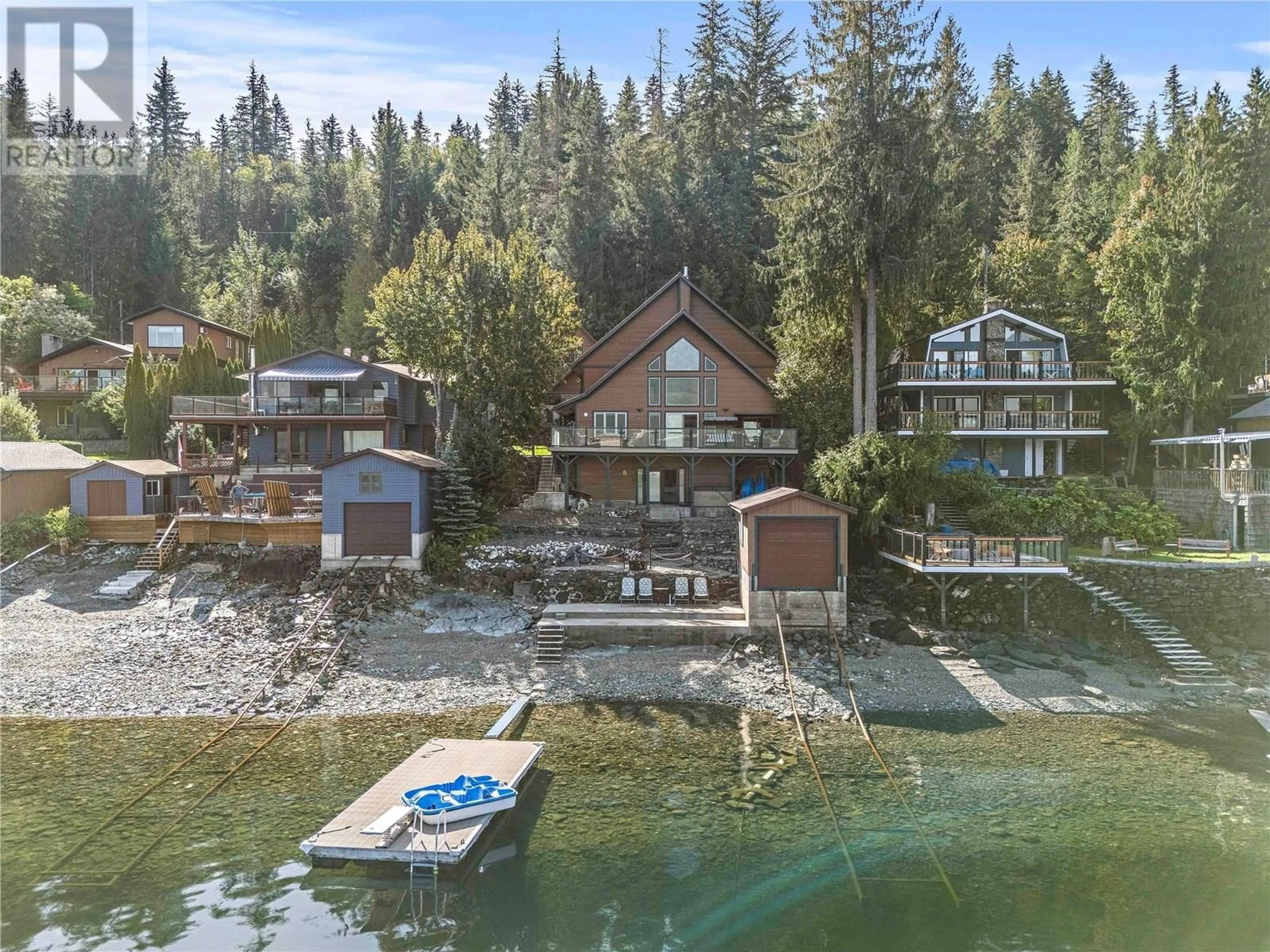 A pic from outside/outdoor area/front of a property/back of a property/a pic from drone, water/lake/river/ocean view for 4279 JUSTIN ROAD, Eagle Bay British Columbia V0E1T0