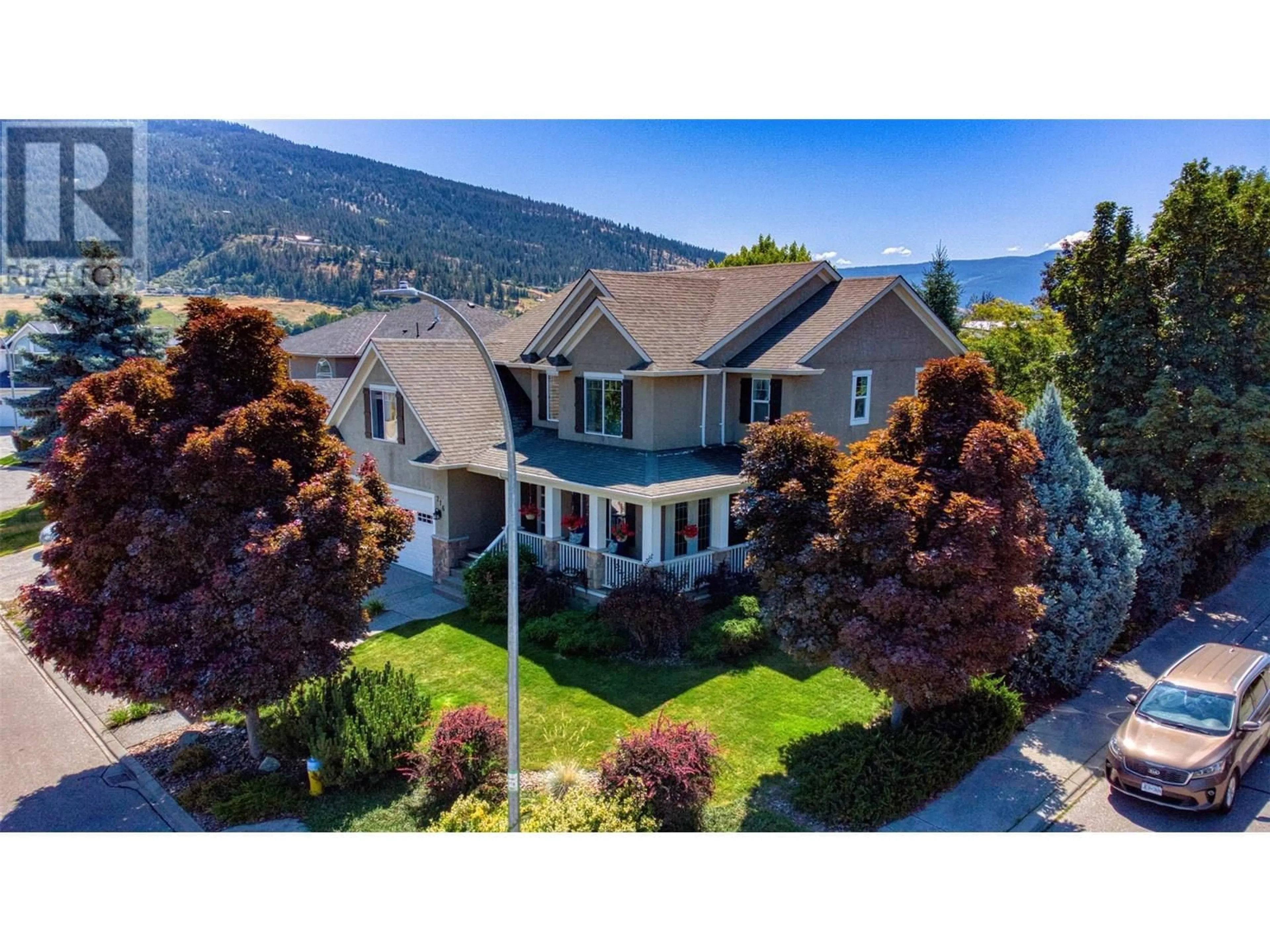 A pic from outside/outdoor area/front of a property/back of a property/a pic from drone, mountain view for 716 CAVALIER COURT, Vernon British Columbia V1T9M6