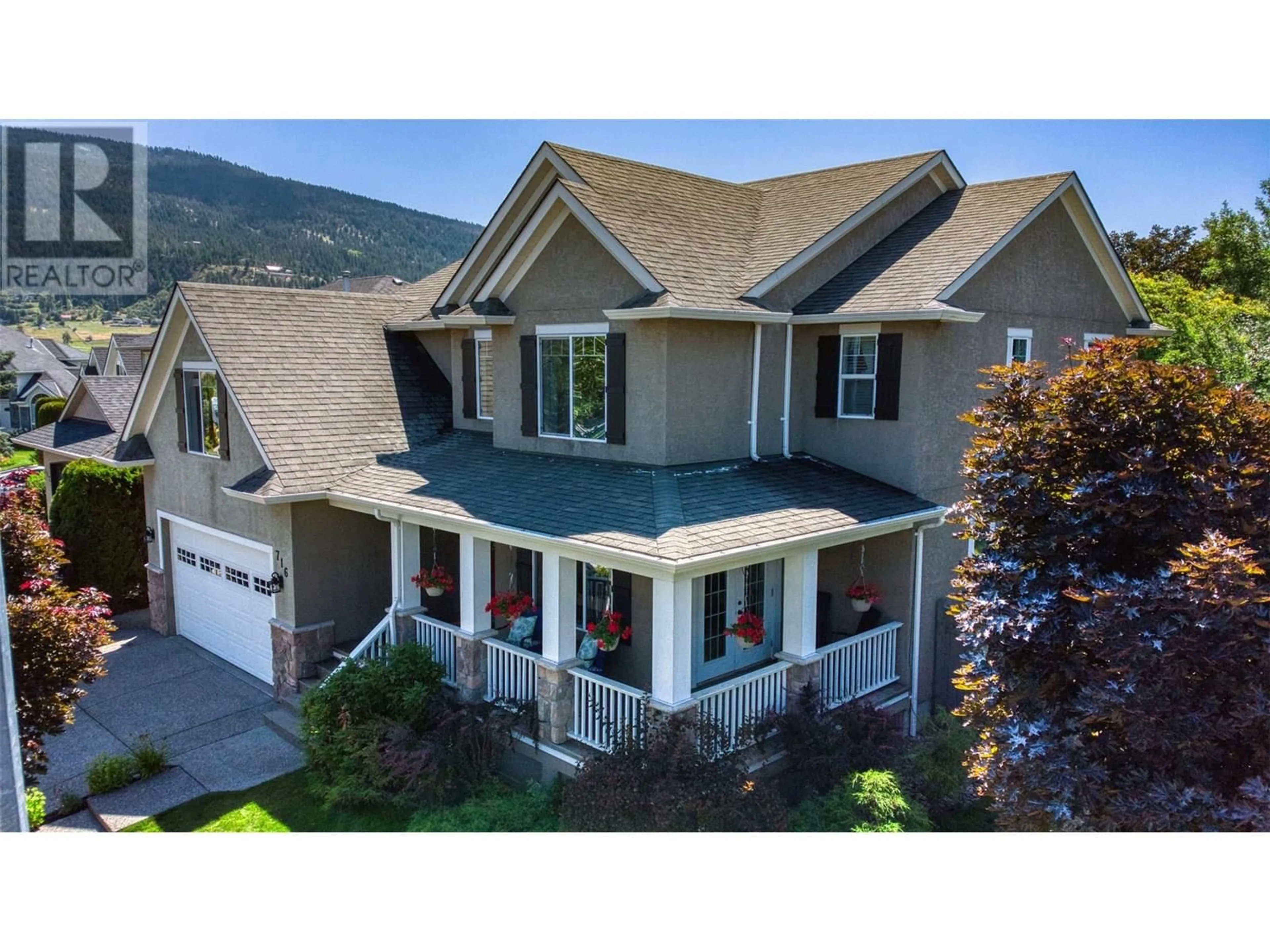 Home with vinyl exterior material, mountain view for 716 CAVALIER COURT, Vernon British Columbia V1T9M6