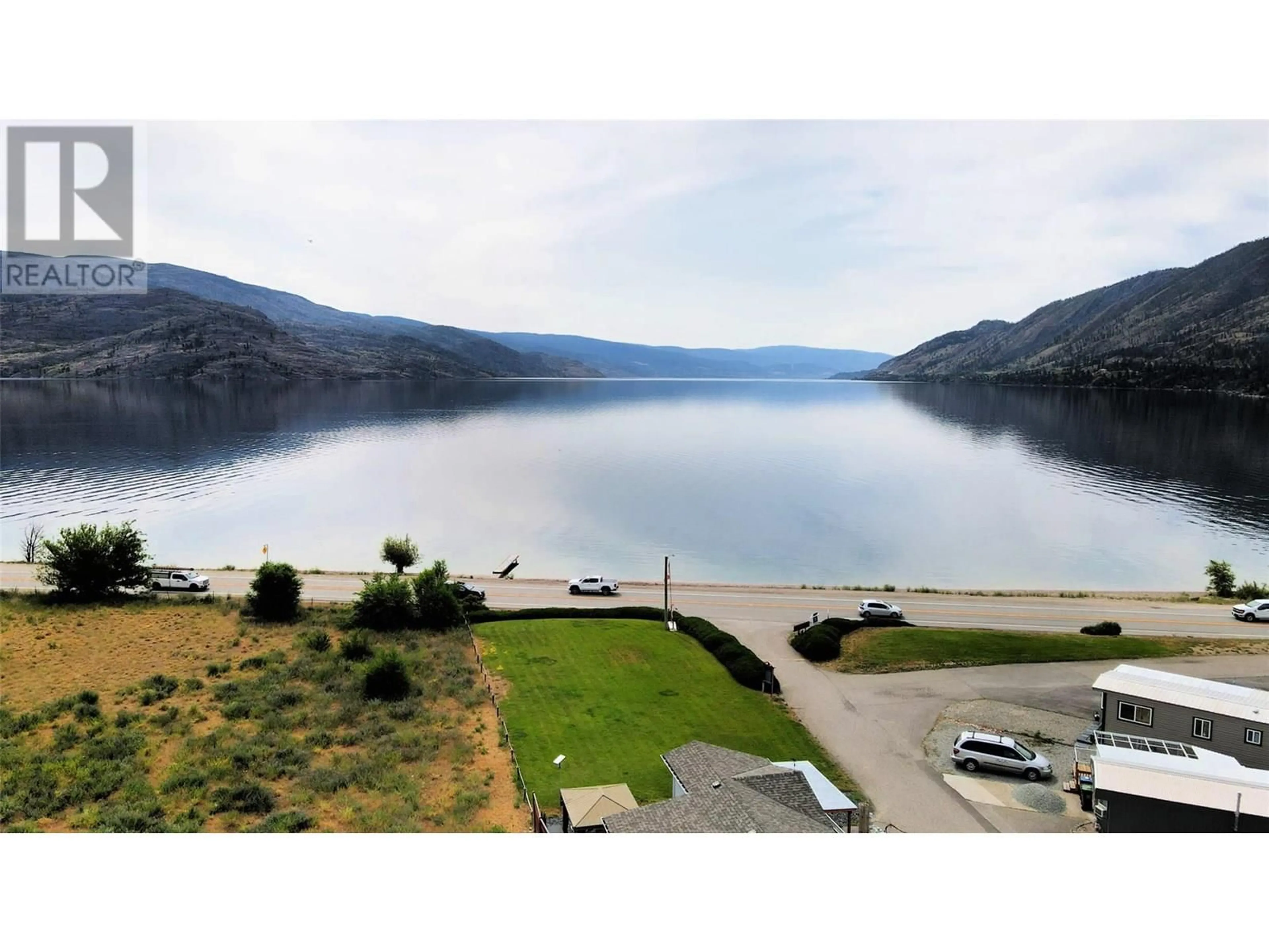 A pic from outside/outdoor area/front of a property/back of a property/a pic from drone, water/lake/river/ocean view for 16 - 6711 HWY 97S HIGHWAY, Peachland British Columbia V0H1X9