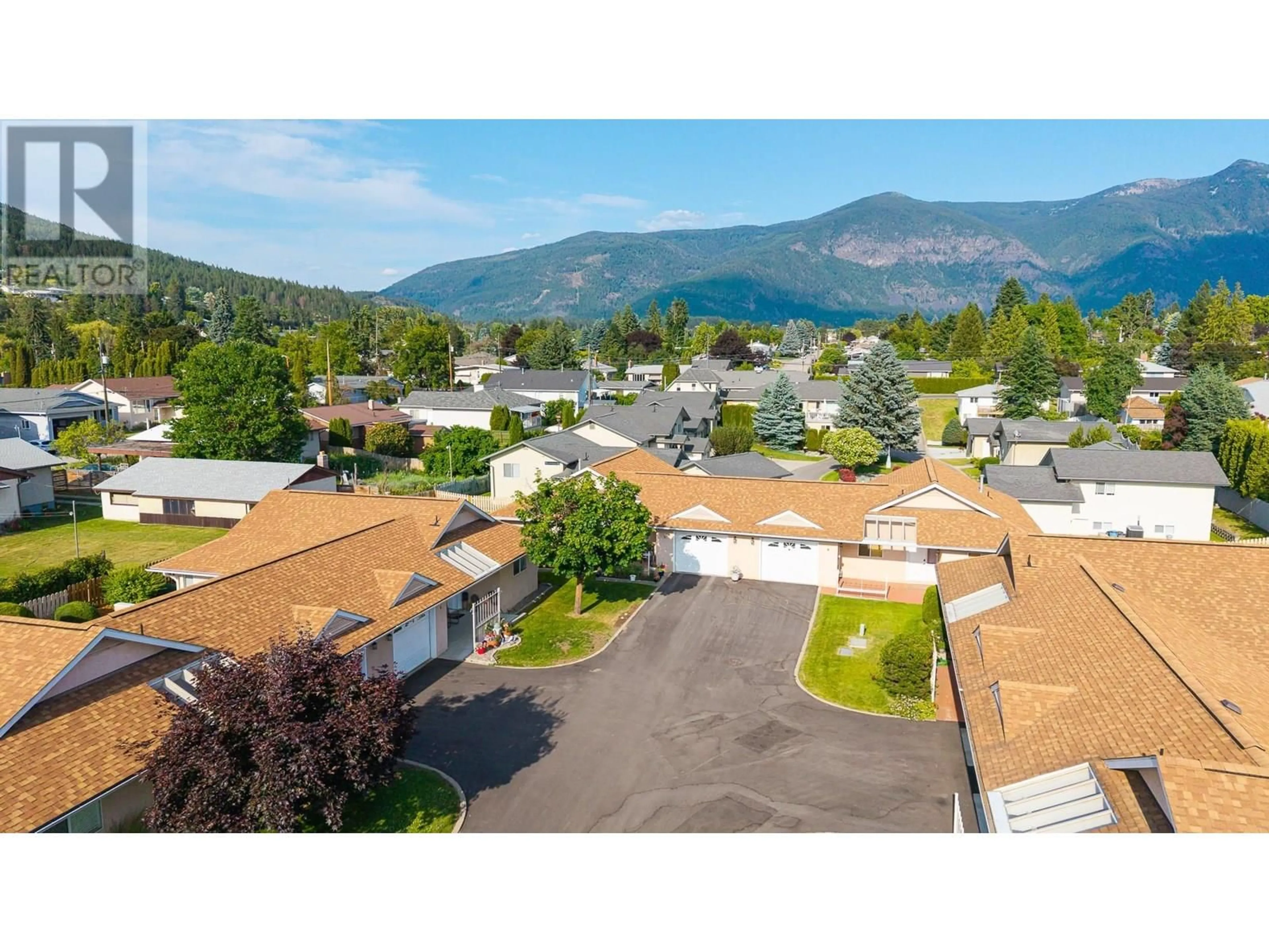 A pic from outside/outdoor area/front of a property/back of a property/a pic from drone, mountain view for 5 - 518 18TH AVENUE SOUTH, Creston British Columbia V0B1G0