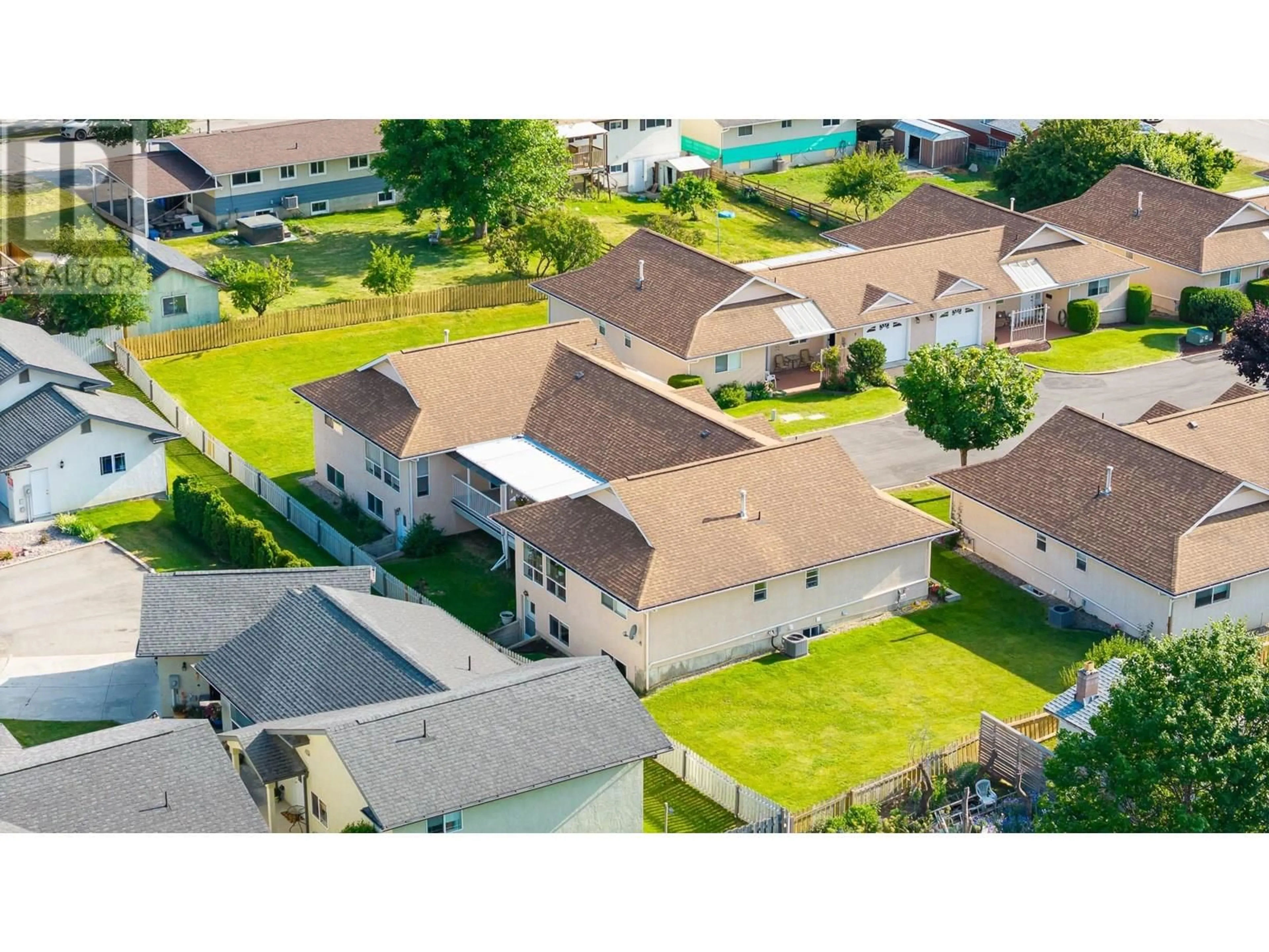 A pic from outside/outdoor area/front of a property/back of a property/a pic from drone, street for 5 - 518 18TH AVENUE SOUTH, Creston British Columbia V0B1G0