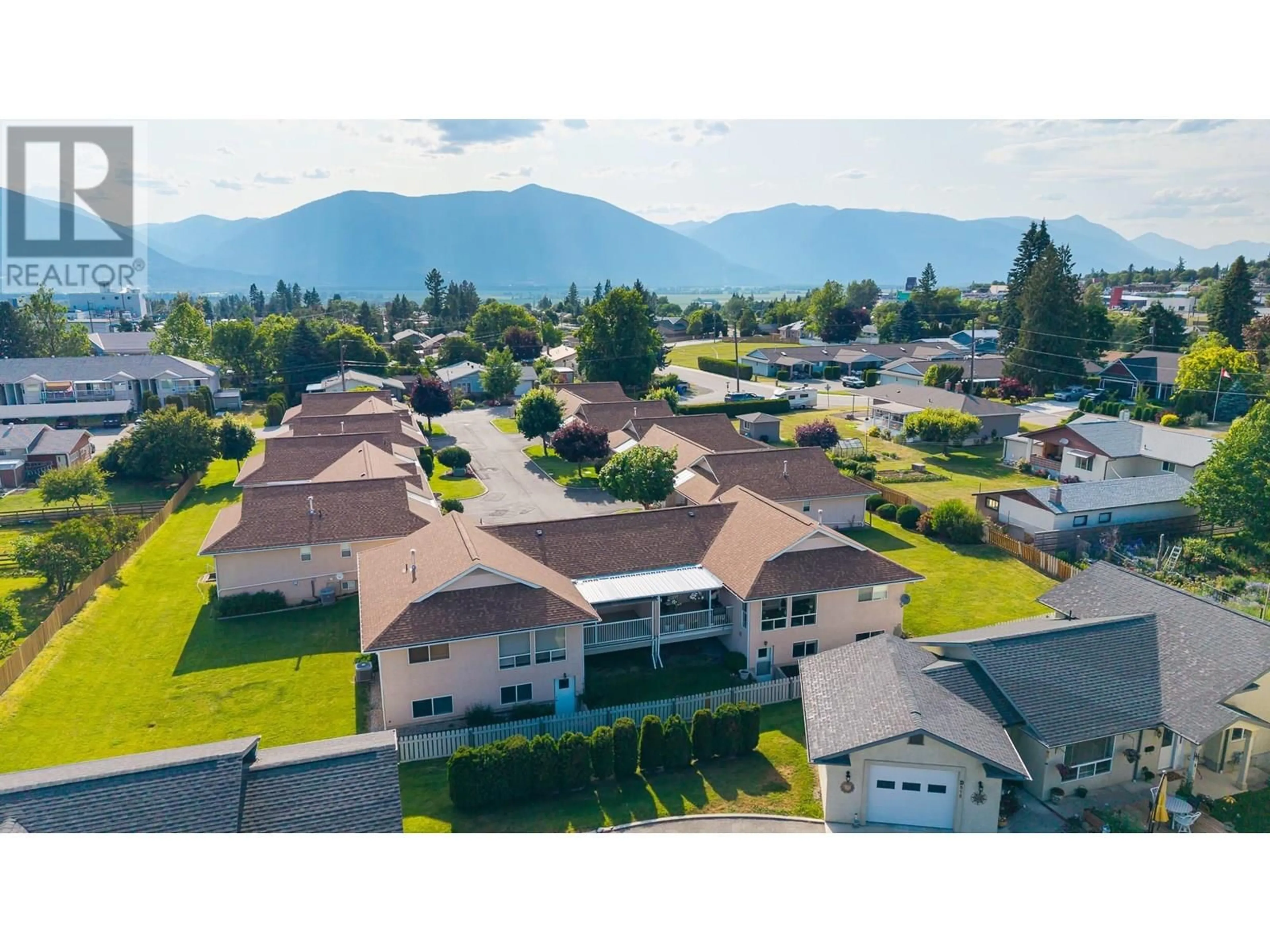 A pic from outside/outdoor area/front of a property/back of a property/a pic from drone, mountain view for 5 - 518 18TH AVENUE SOUTH, Creston British Columbia V0B1G0