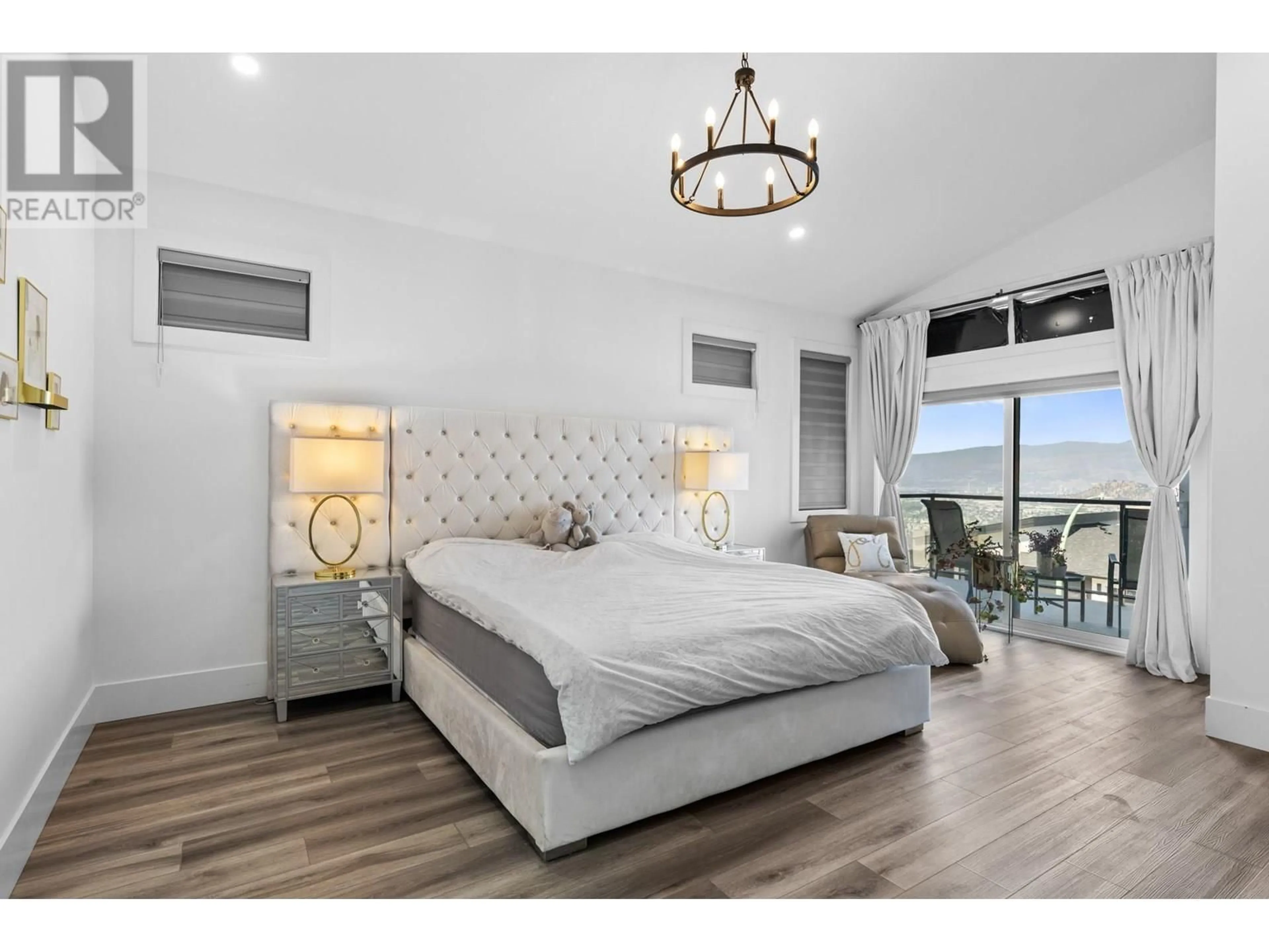 Bedroom with bed, wood/laminate floor for 683 DEANS DRIVE, Kelowna British Columbia V1P1A1