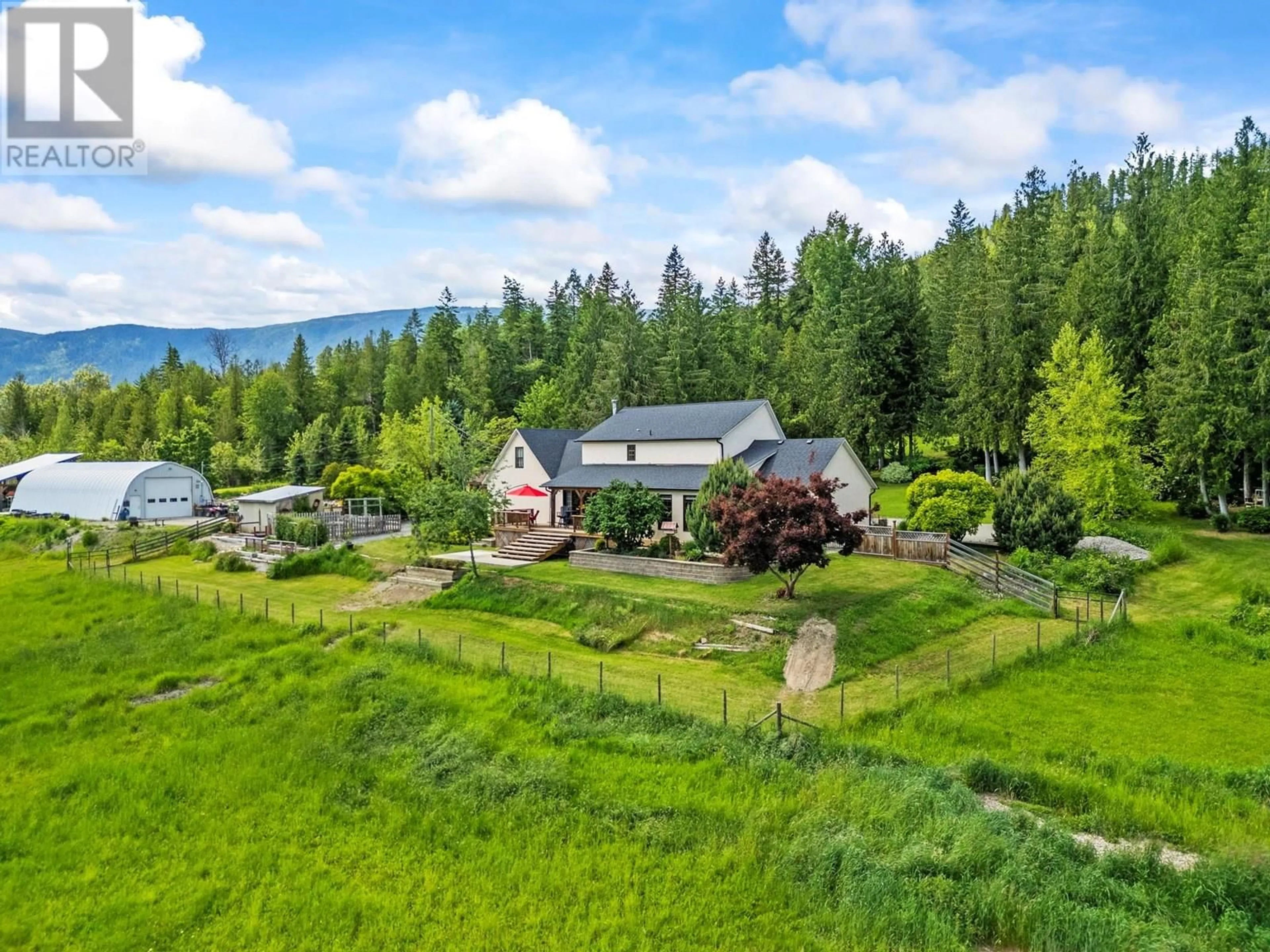 A pic from outside/outdoor area/front of a property/back of a property/a pic from drone, mountain view for 53 CAWLEY ROAD, Enderby British Columbia V0E1V5