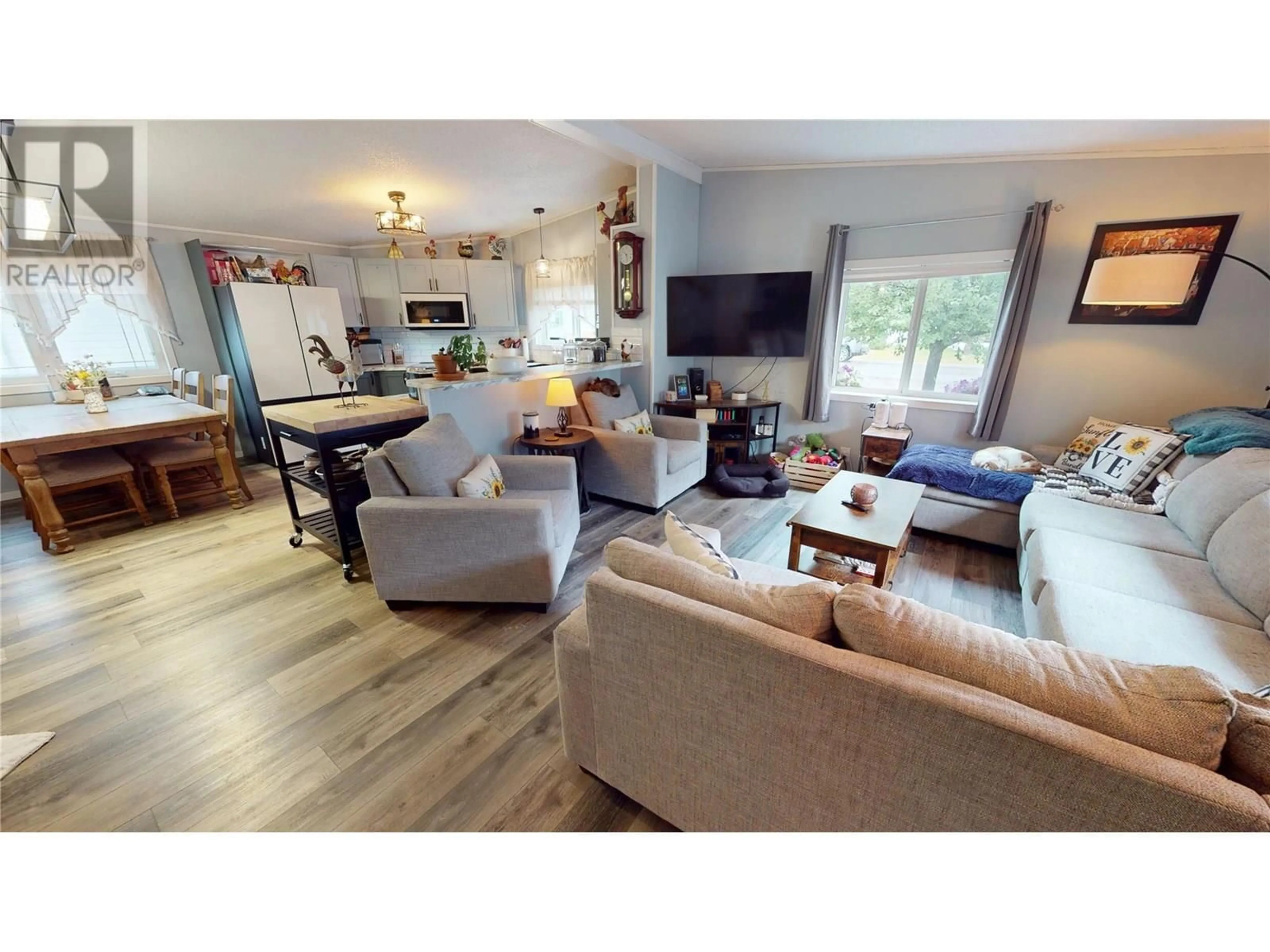 Living room with furniture, wood/laminate floor for 19 SLALOM DRIVE, Fernie British Columbia V0B1M4