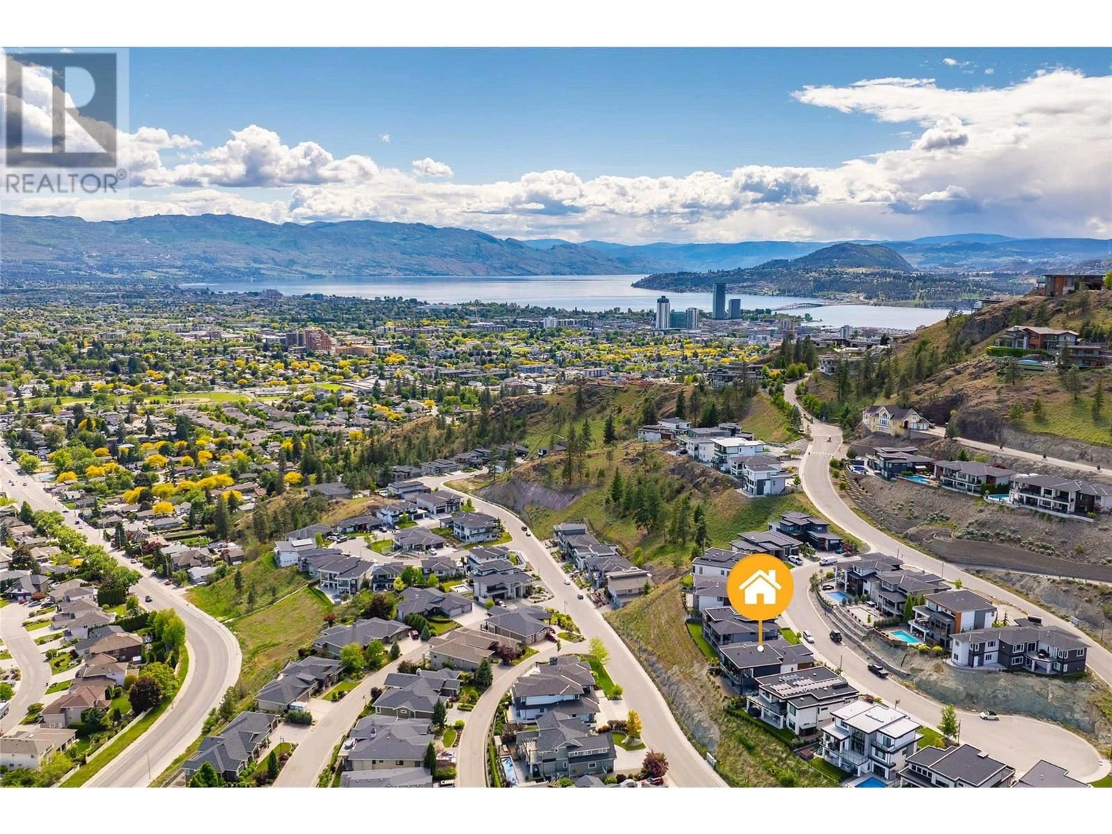 A pic from outside/outdoor area/front of a property/back of a property/a pic from drone, mountain view for 1455 BENZER COURT, Kelowna British Columbia V1V2Y1