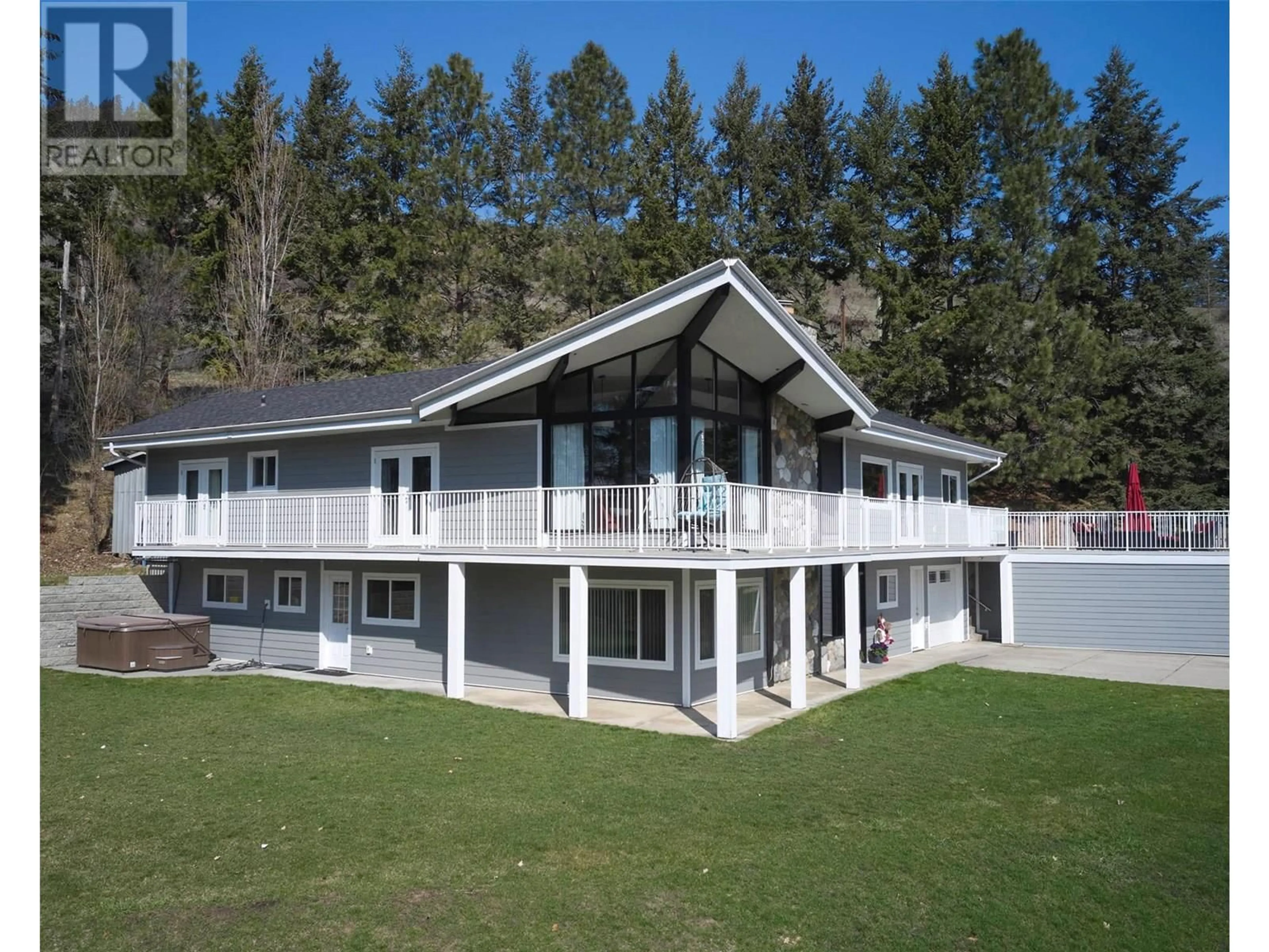 A pic from outside/outdoor area/front of a property/back of a property/a pic from drone, unknown for 5719 6 HIGHWAY, Coldstream British Columbia V1B3E1