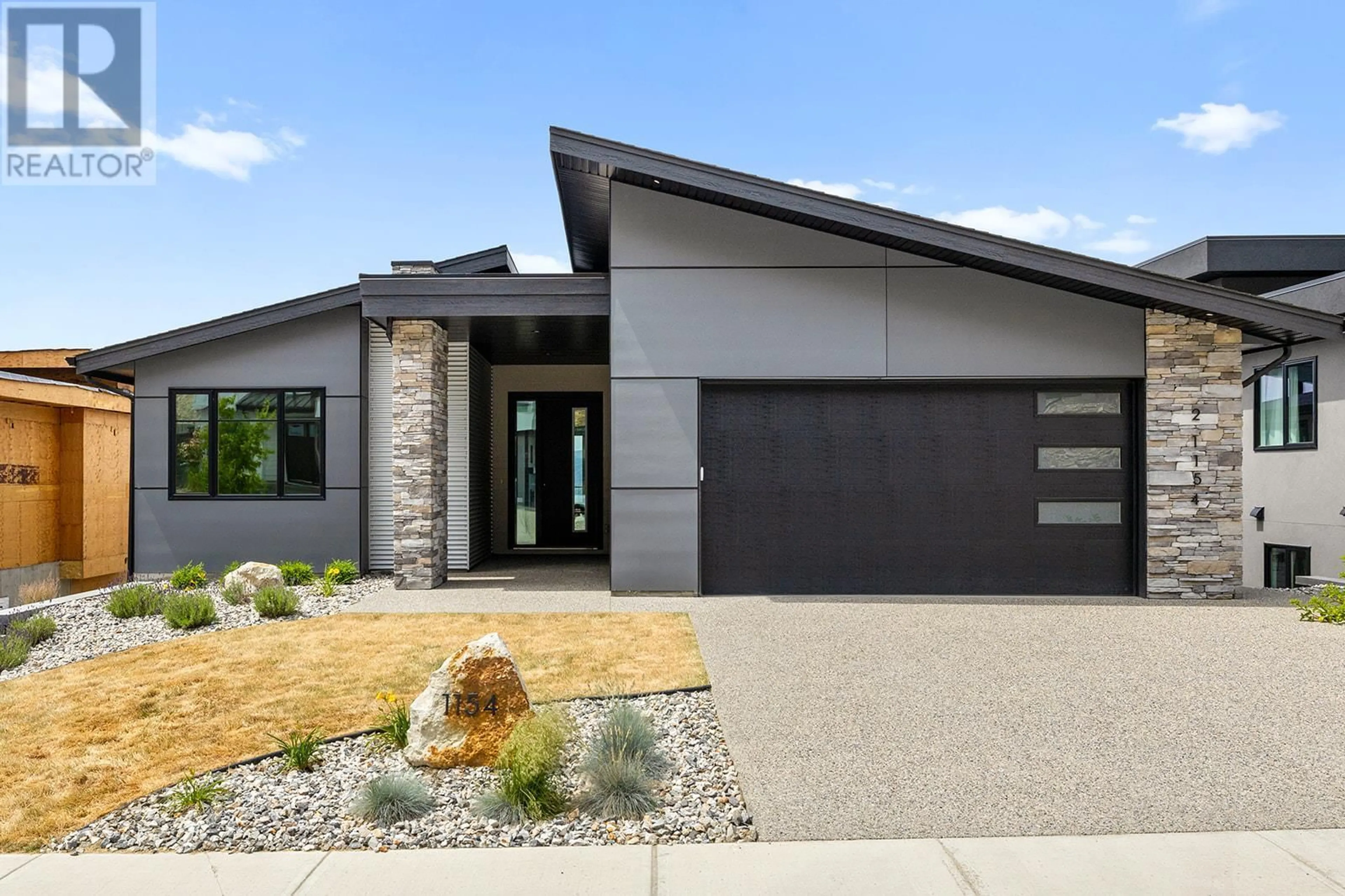 Home with brick exterior material, street for 1154 LONE PINE DRIVE, Kelowna British Columbia V1P0A5