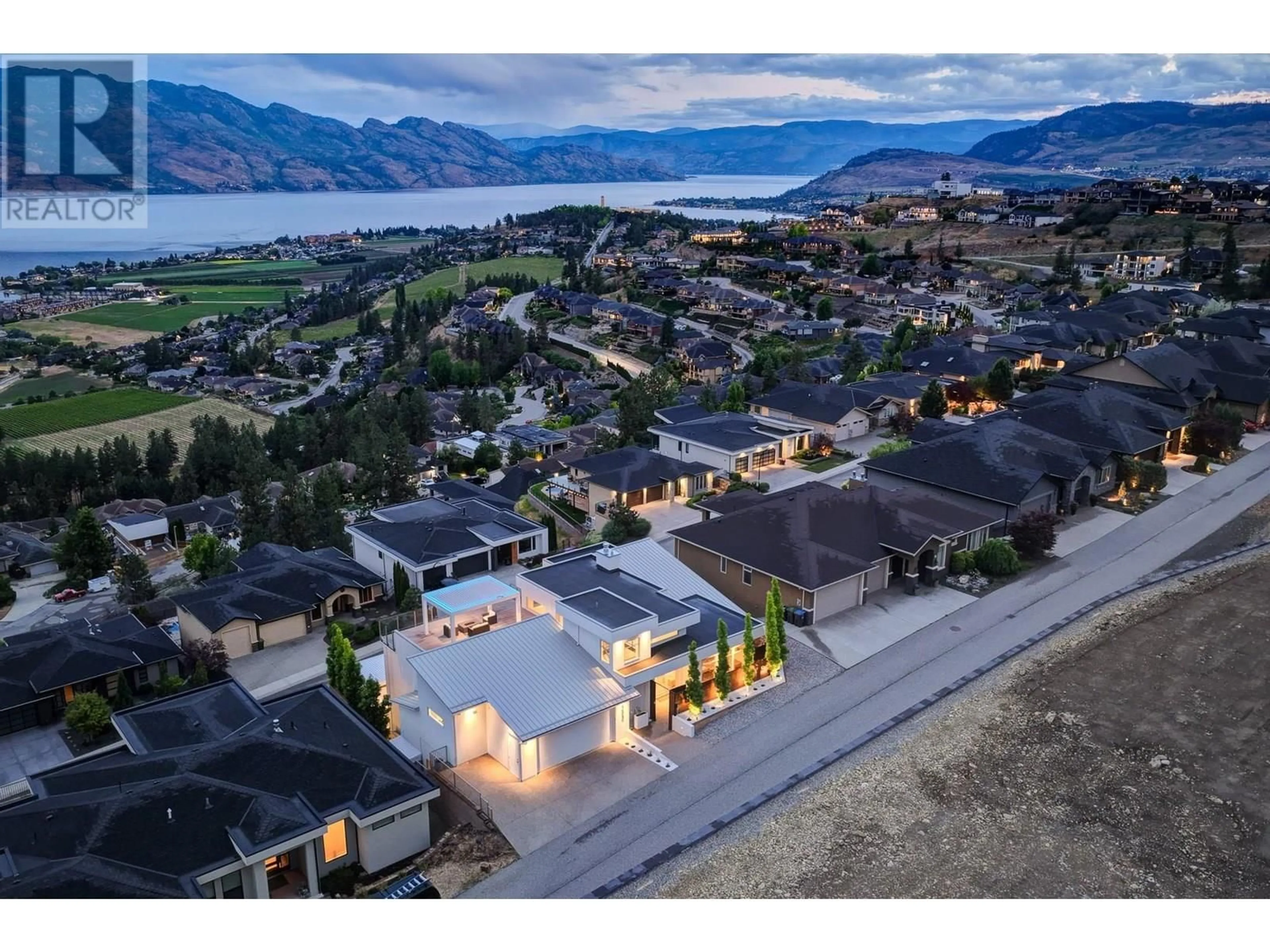 A pic from outside/outdoor area/front of a property/back of a property/a pic from drone, mountain view for 1384 PINOT NOIR DRIVE, West Kelowna British Columbia V4T3J1