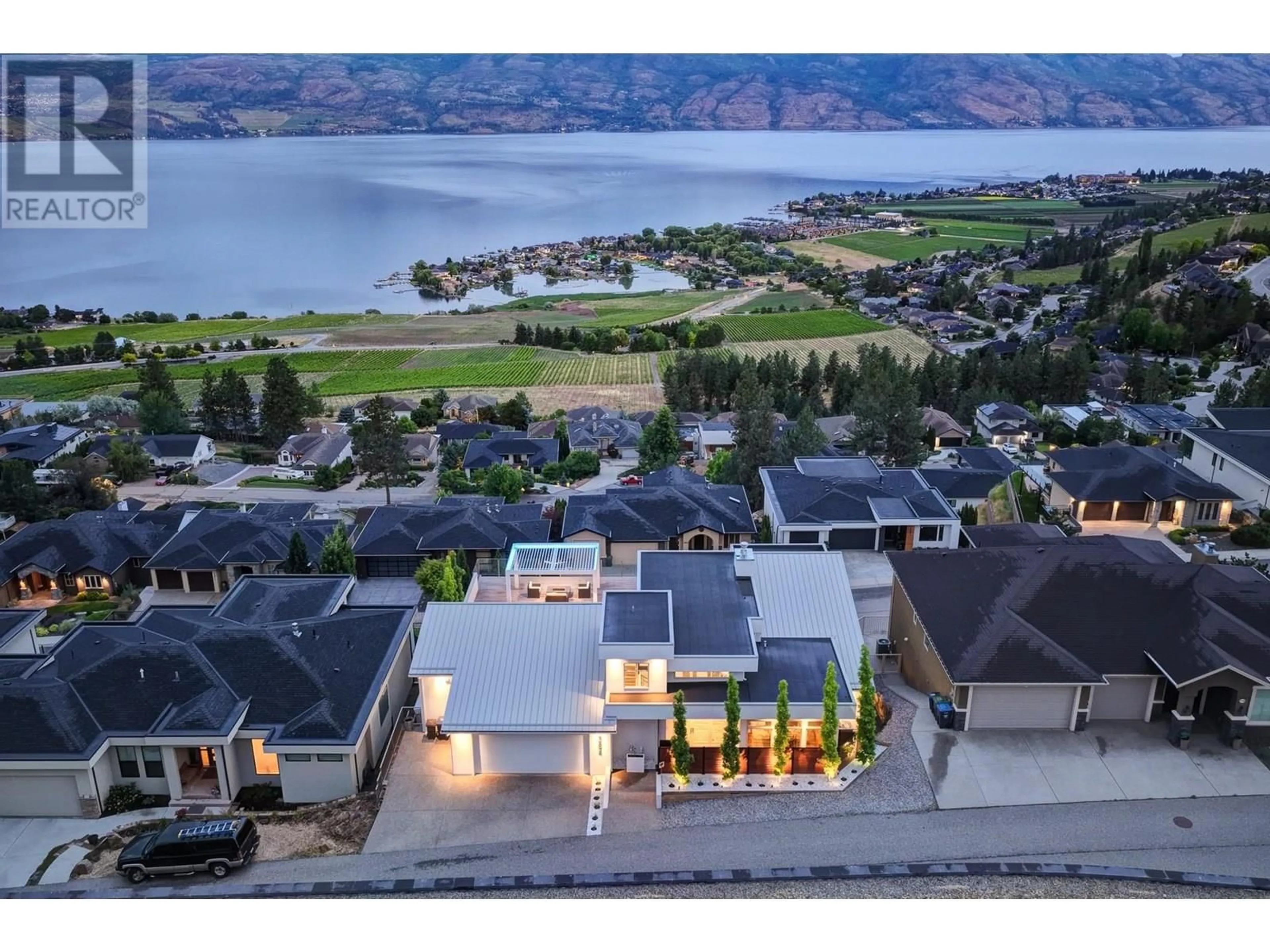 A pic from outside/outdoor area/front of a property/back of a property/a pic from drone, water/lake/river/ocean view for 1384 PINOT NOIR DRIVE, West Kelowna British Columbia V4T3J1