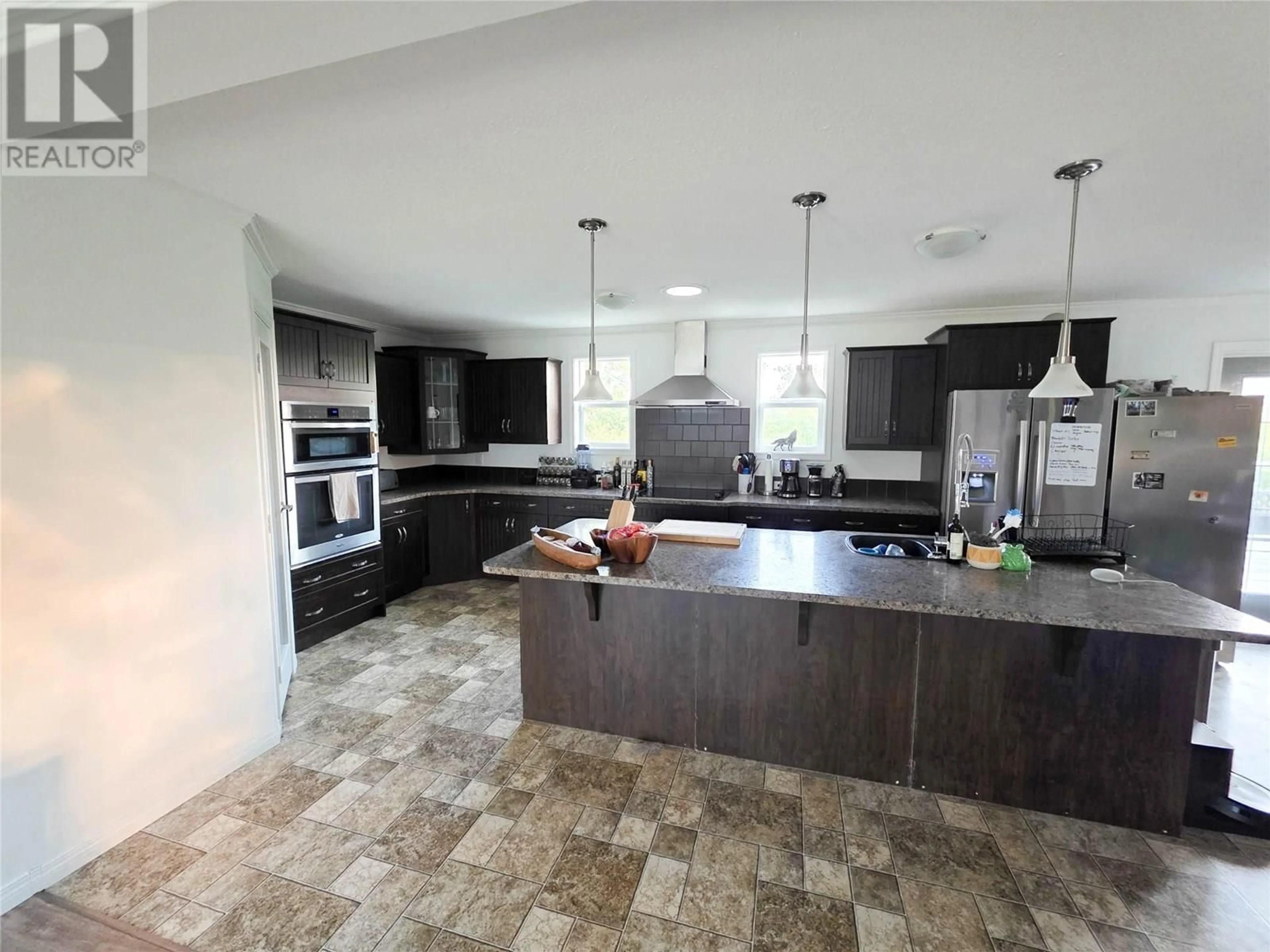 Open concept kitchen, ceramic/tile floor for 4811 BISSETTE DRIVE, Pouce Coupe British Columbia V0C2C0