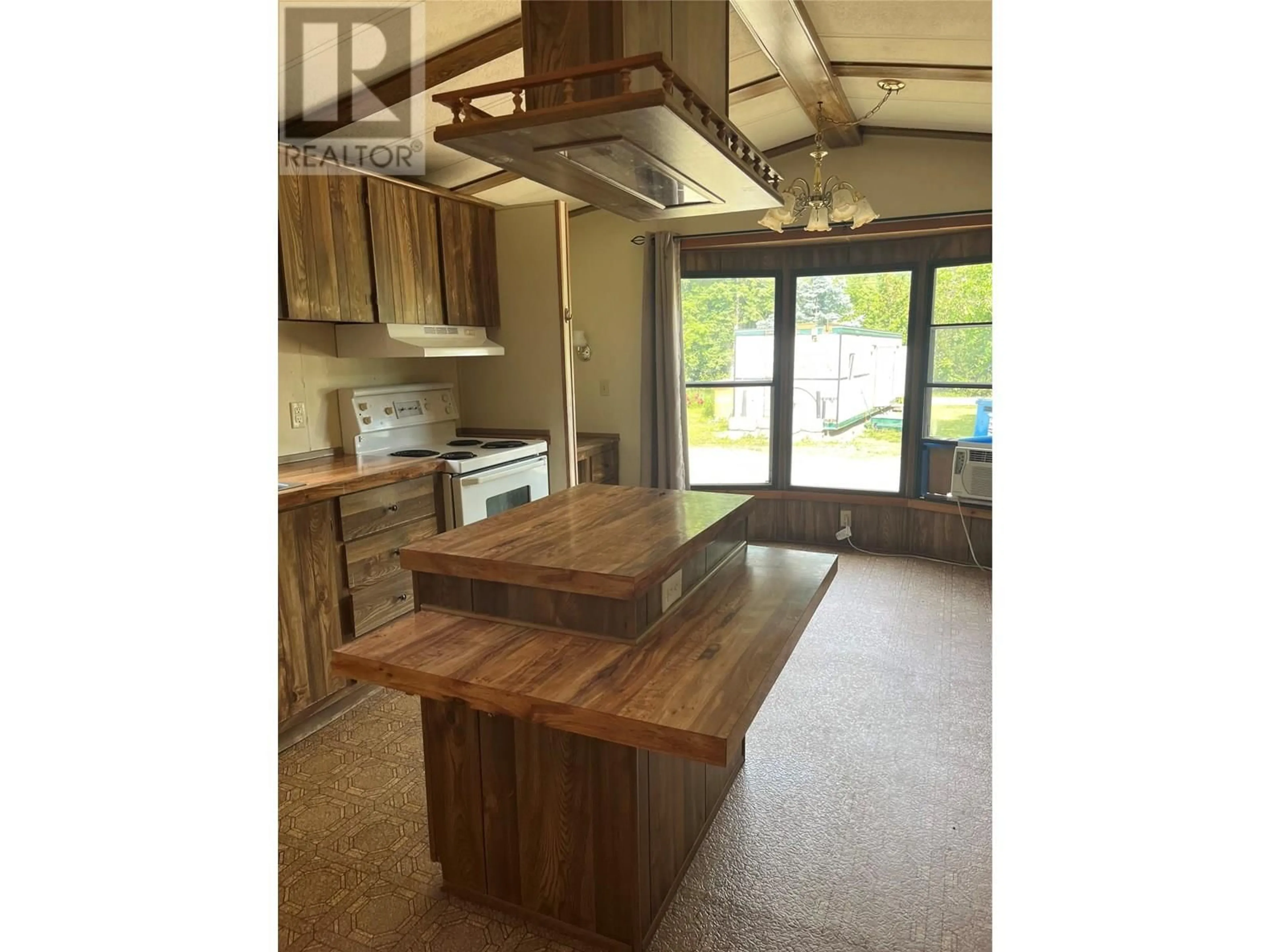 Open concept kitchen, wood/laminate floor for 2 - 4232 ELDON FRONTAGE ROAD, Tappen British Columbia V0E2X0