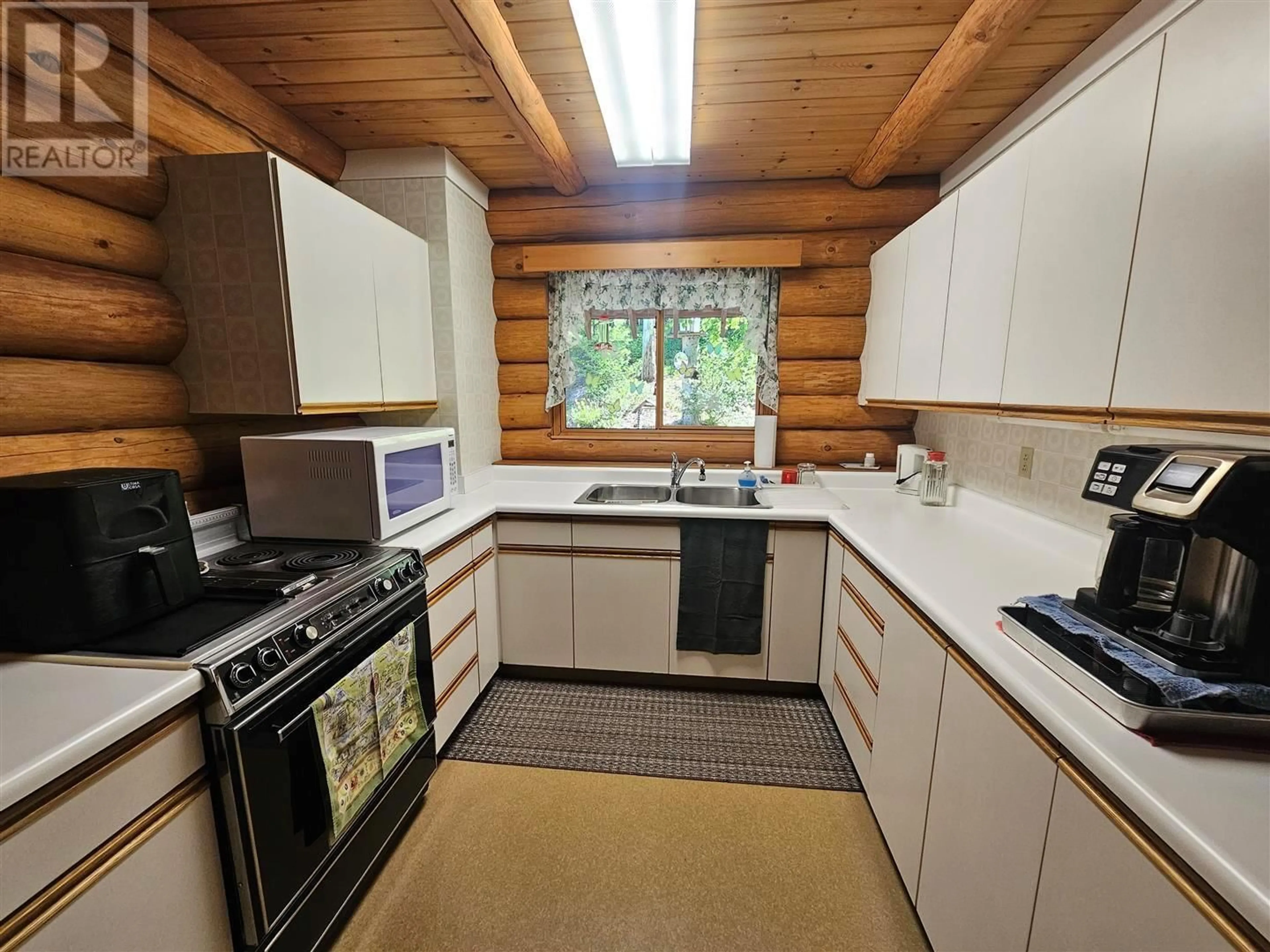 Standard kitchen, wood/laminate floor for 2910 BOTANIE CREEK ROAD, Lytton British Columbia V0K1Z0