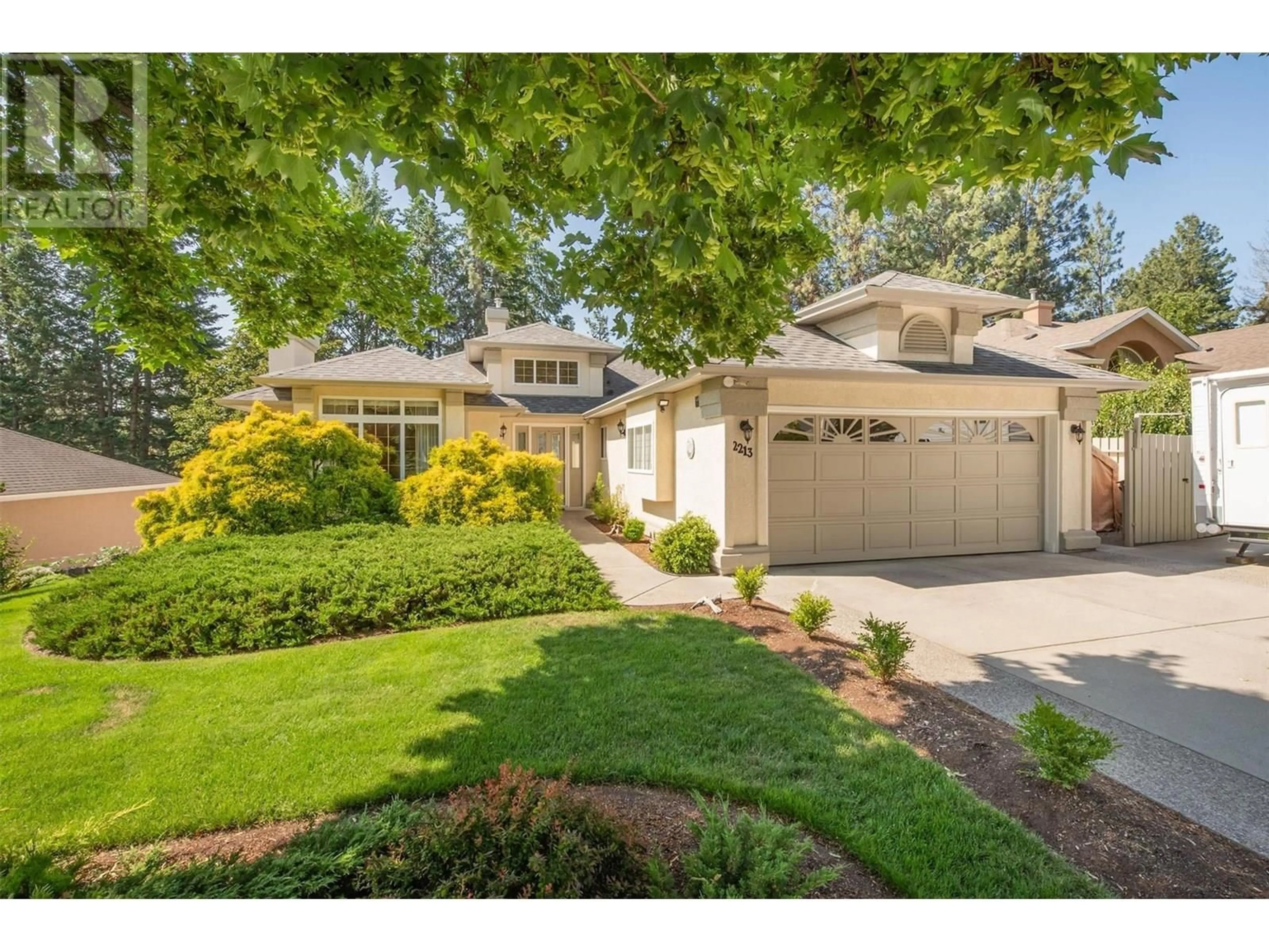Home with vinyl exterior material, street for 2213 SHANNON WOODS PLACE, West Kelowna British Columbia V4T2L9