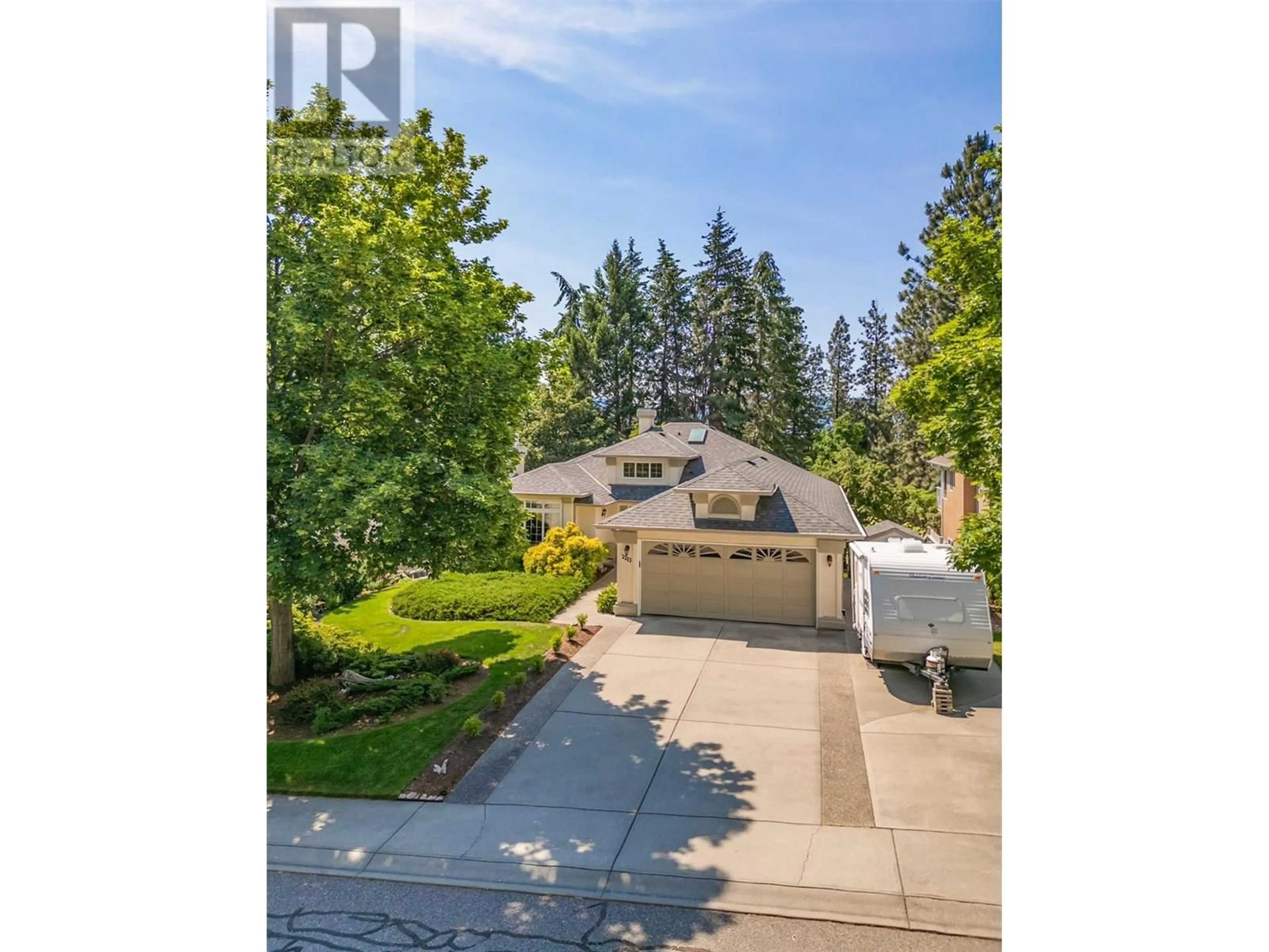 A pic from outside/outdoor area/front of a property/back of a property/a pic from drone, street for 2213 SHANNON WOODS PLACE, West Kelowna British Columbia V4T2L9