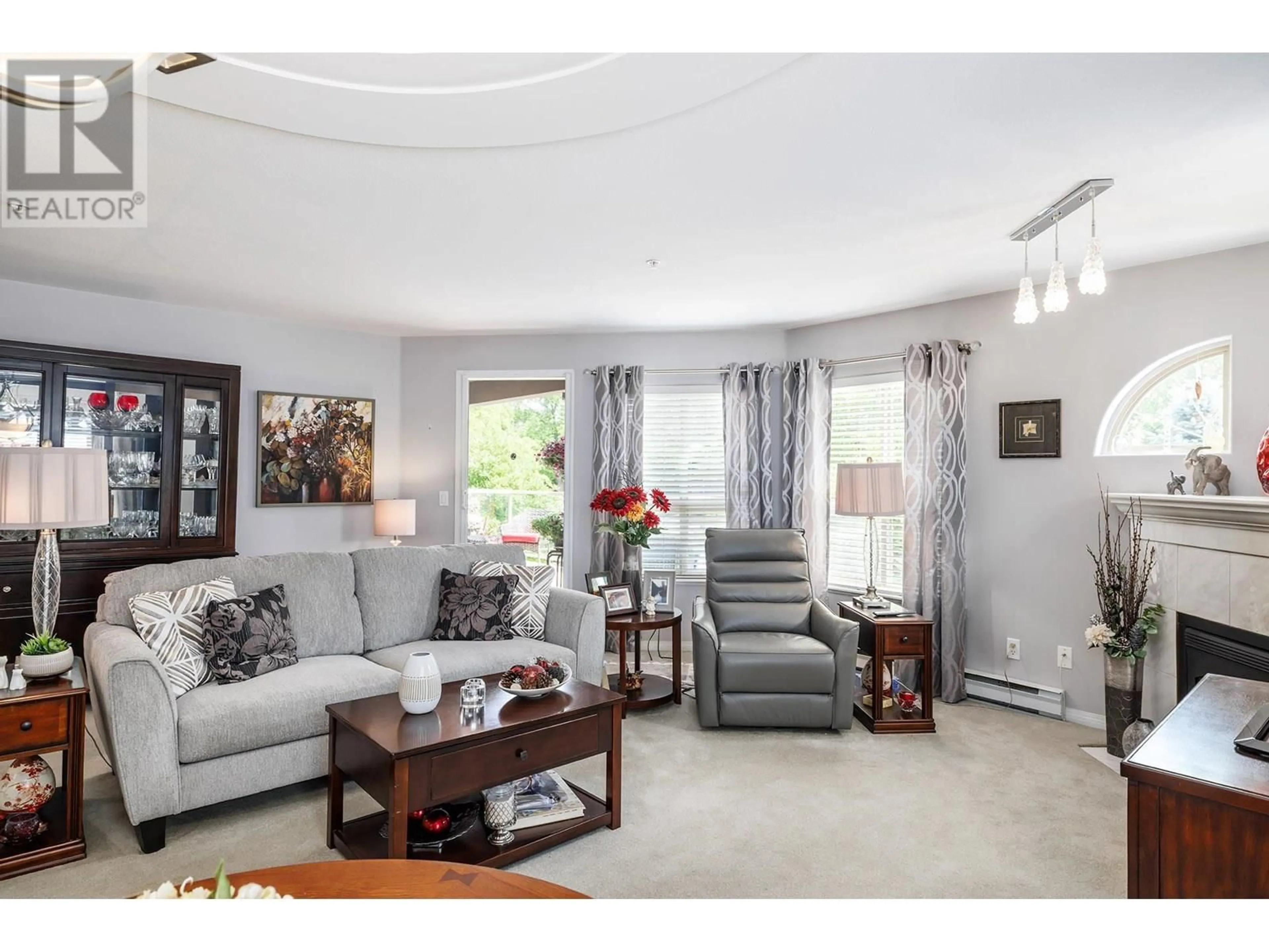 Living room with furniture, unknown for 108 - 2130 VASILE ROAD, Kelowna British Columbia V1Y6H5