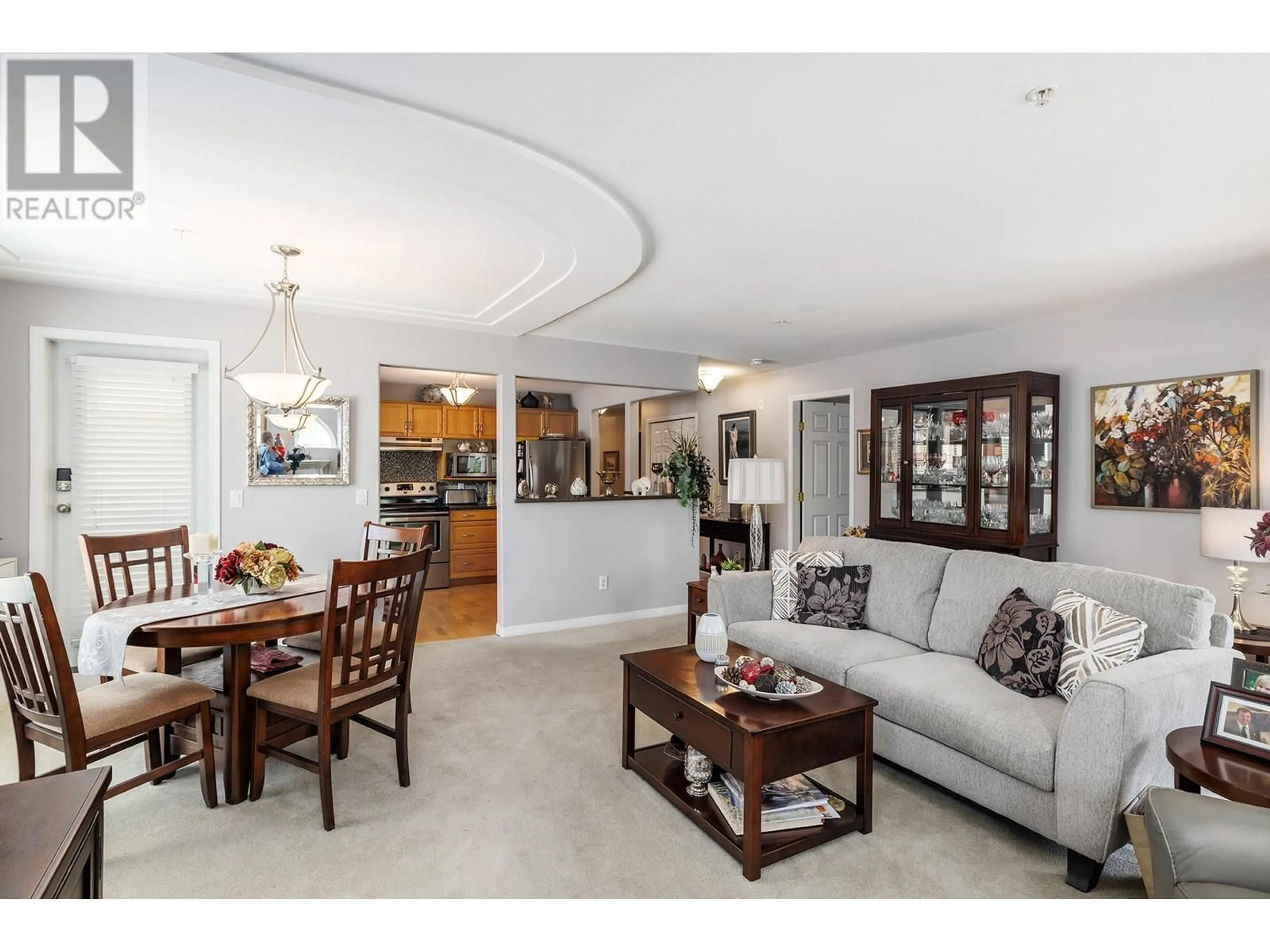 Living room with furniture, ceramic/tile floor for 108 - 2130 VASILE ROAD, Kelowna British Columbia V1Y6H5