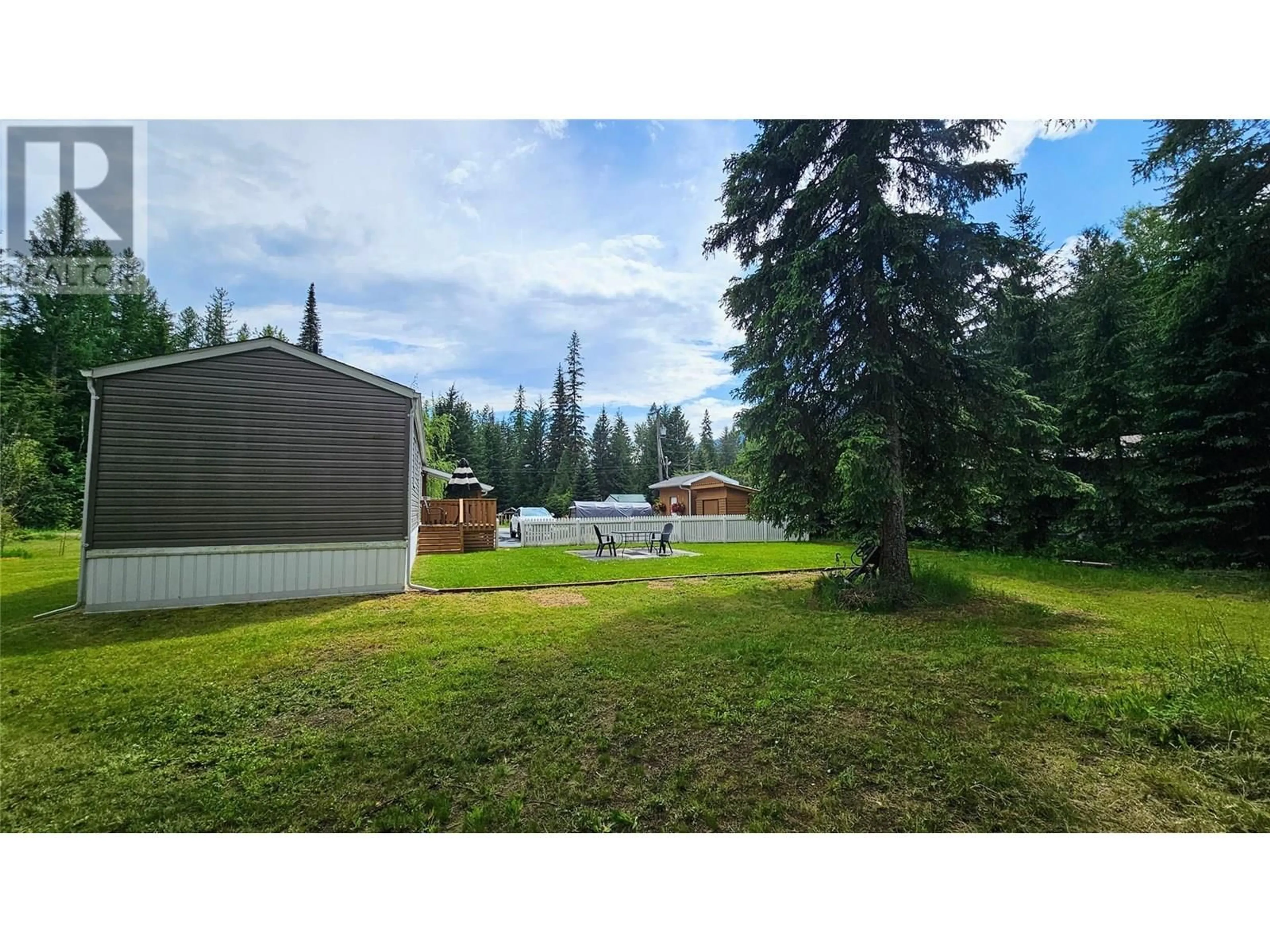 A pic from outside/outdoor area/front of a property/back of a property/a pic from drone, forest/trees view for 219 BELMOND ROAD, Salmo British Columbia V0G1Z0