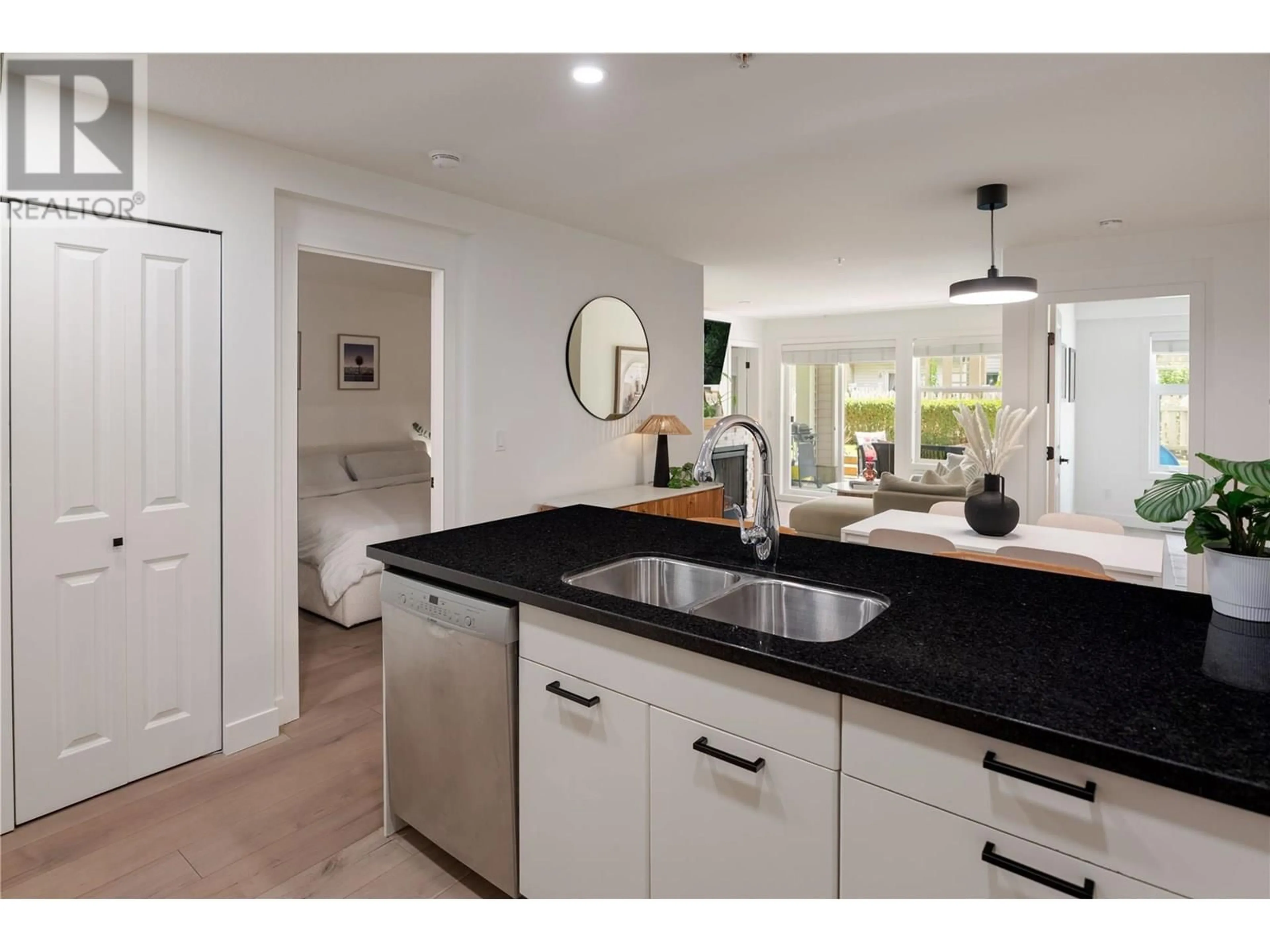 Open concept kitchen, ceramic/tile floor for 105 - 539 YATES ROAD, Kelowna British Columbia V1V2T8